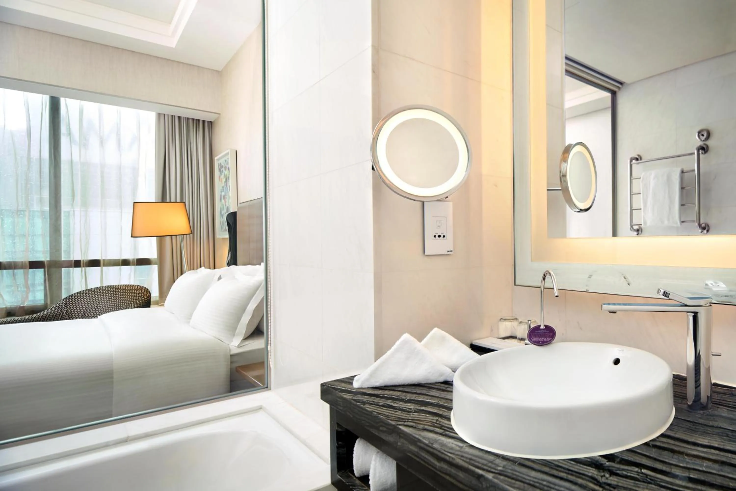 Bathroom, Bed in Carlton City Hotel Singapore