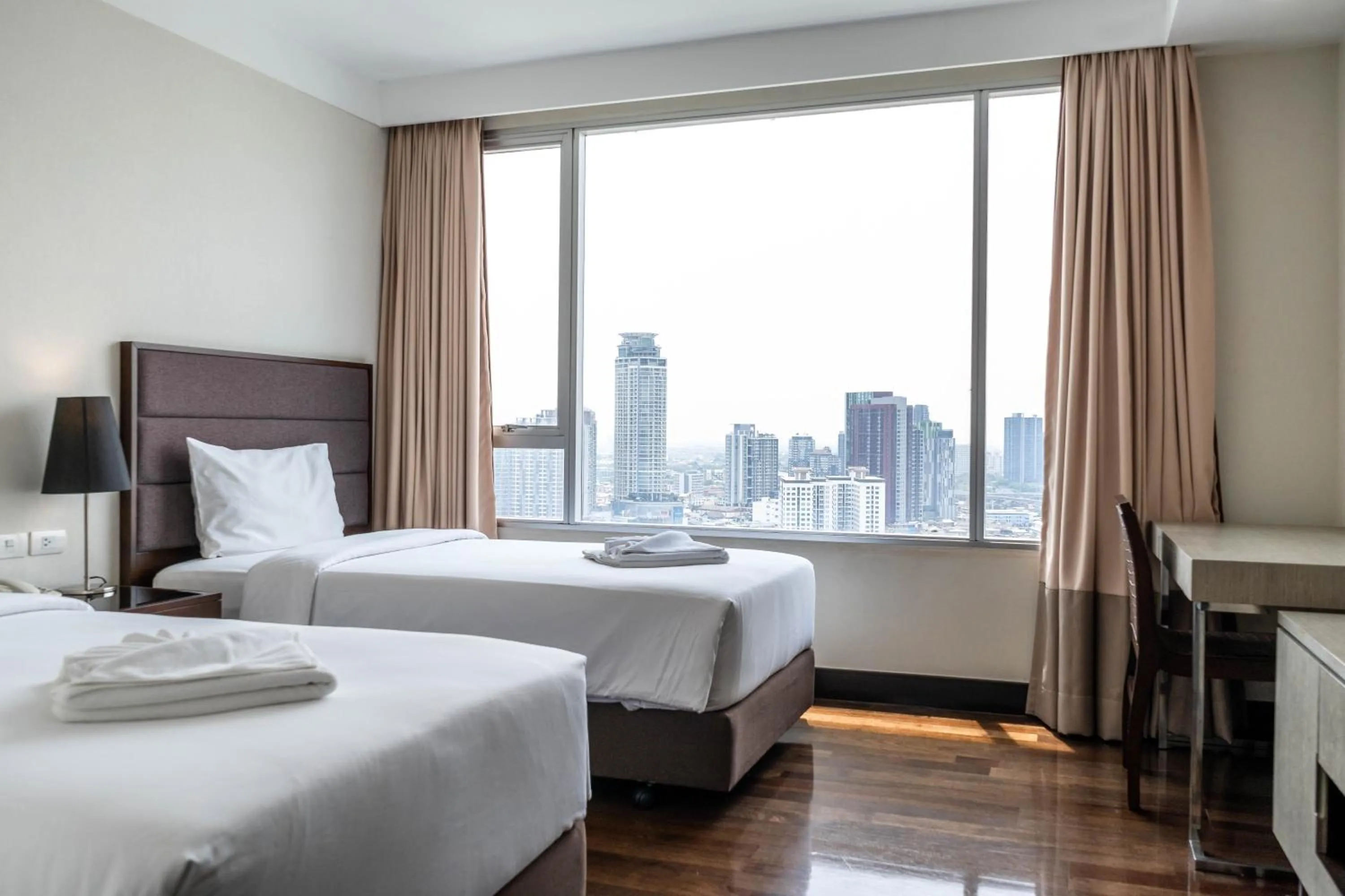 Bed in Jasmine Grande Residence