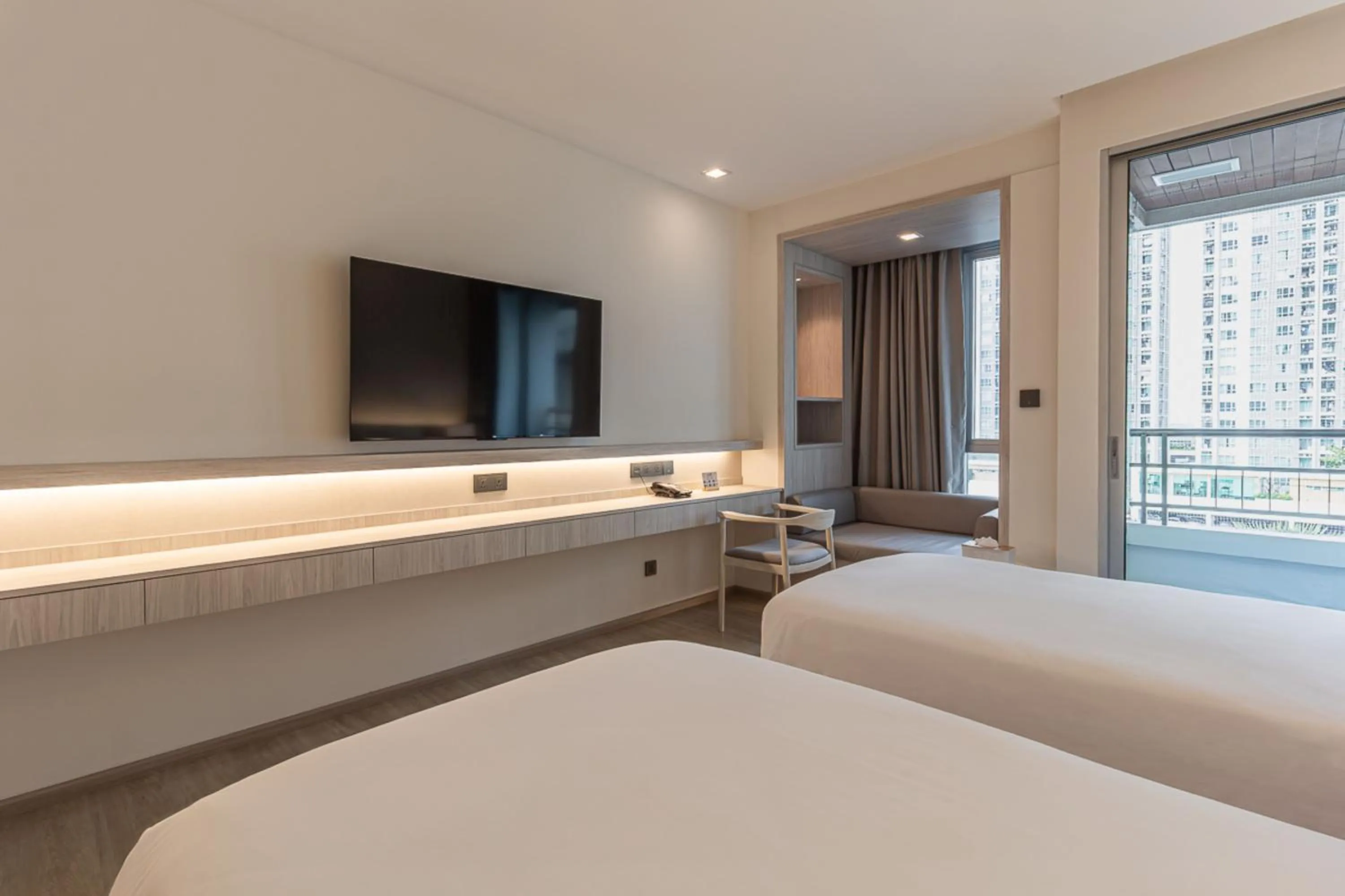 Bed in Jasmine Grande Residence