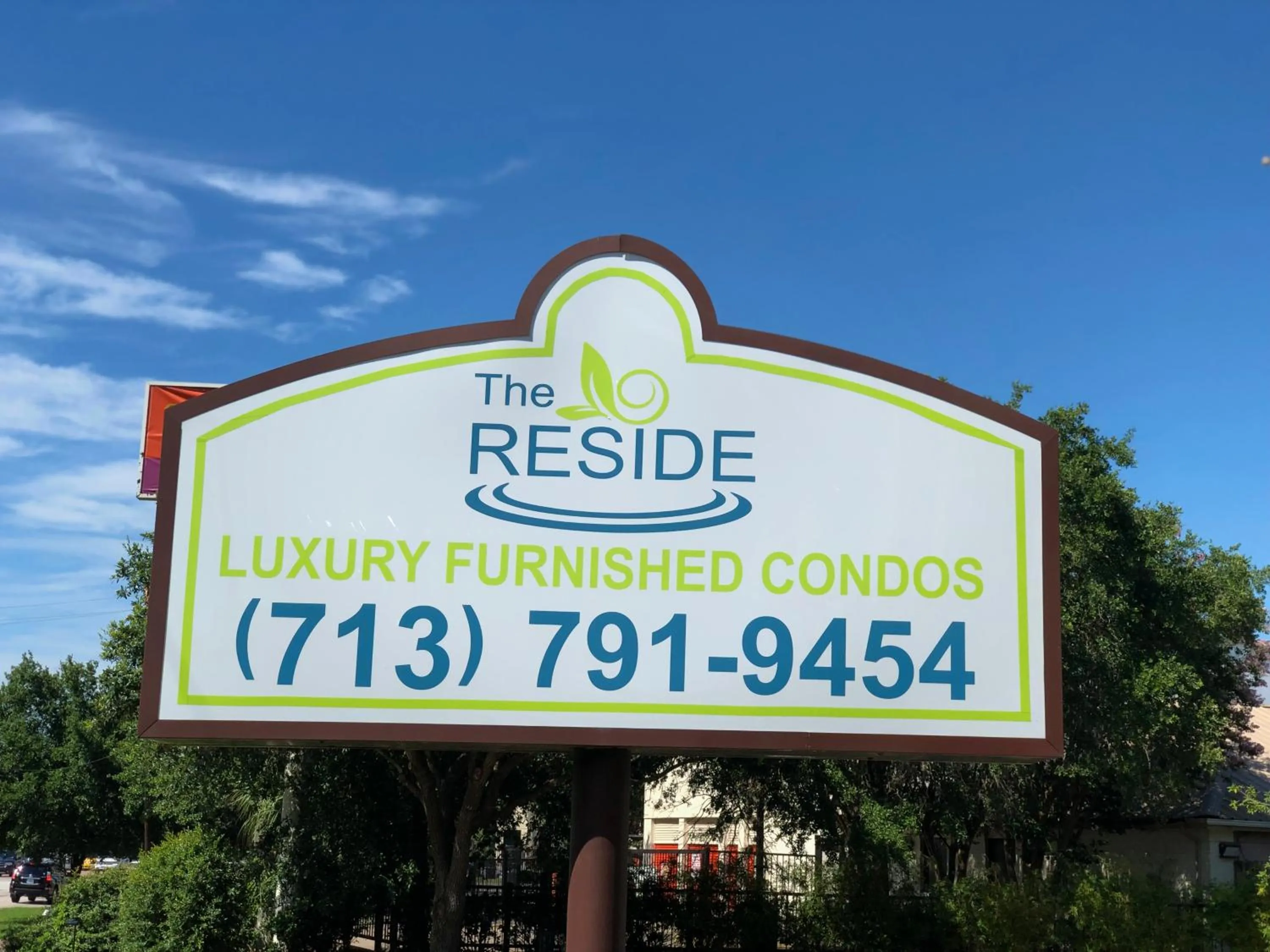 Property logo or sign in The Reside Fully Furnished Condos - Medical Stays Welcome