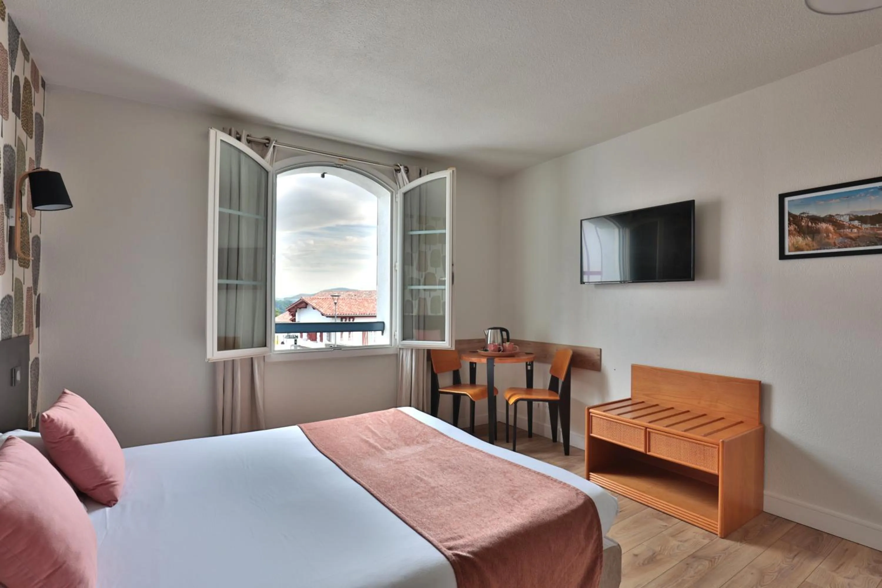 Bed in Hôtel & Appart-hôtel Olatua