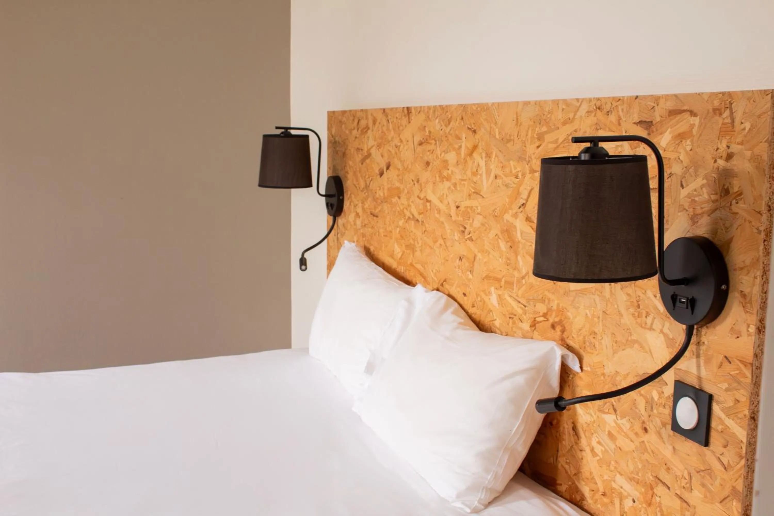 Bed in Hôtel Les Genêts Bayonne