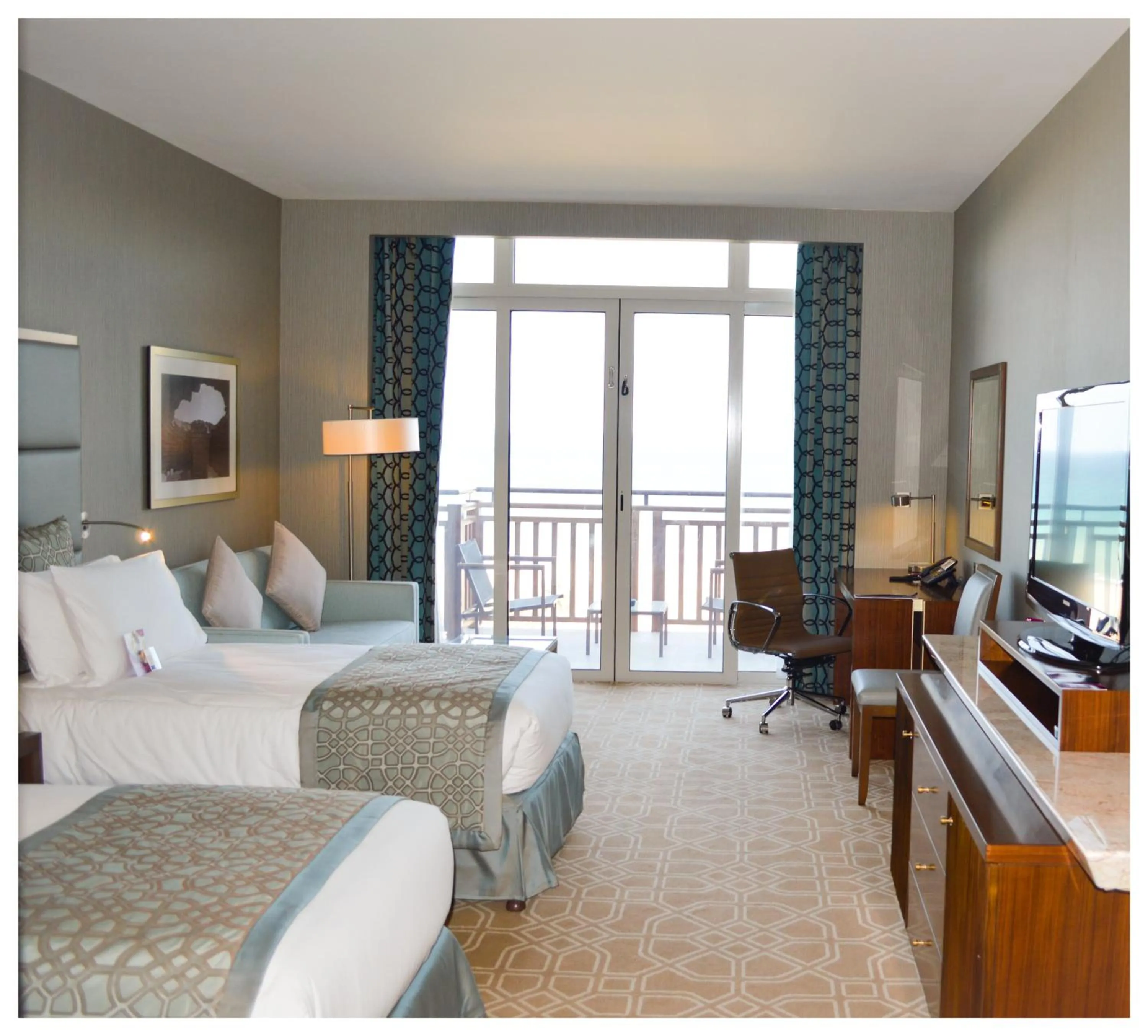 Photo of the whole room, Bed in Crowne Plaza Duqm by IHG