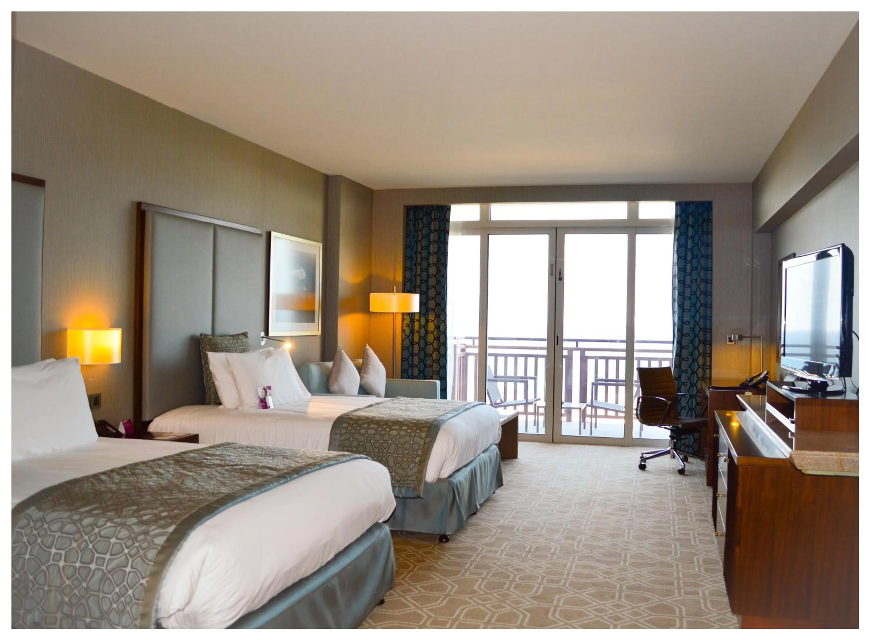 Photo of the whole room, Bed in Crowne Plaza Duqm by IHG