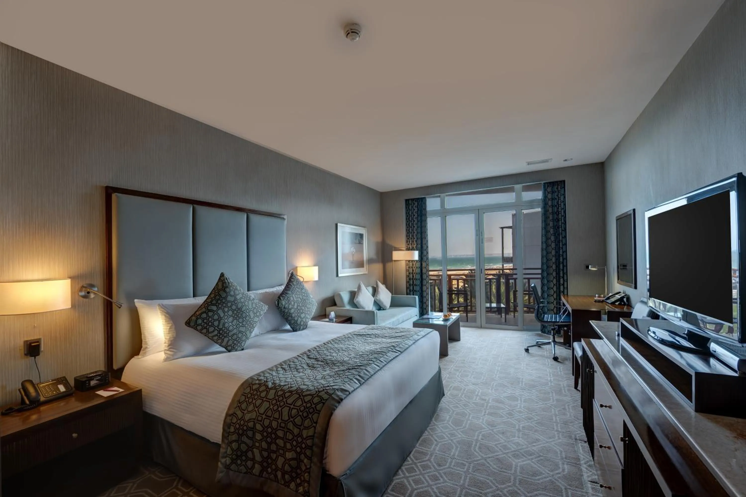 Photo of the whole room, Bed in Crowne Plaza Duqm by IHG
