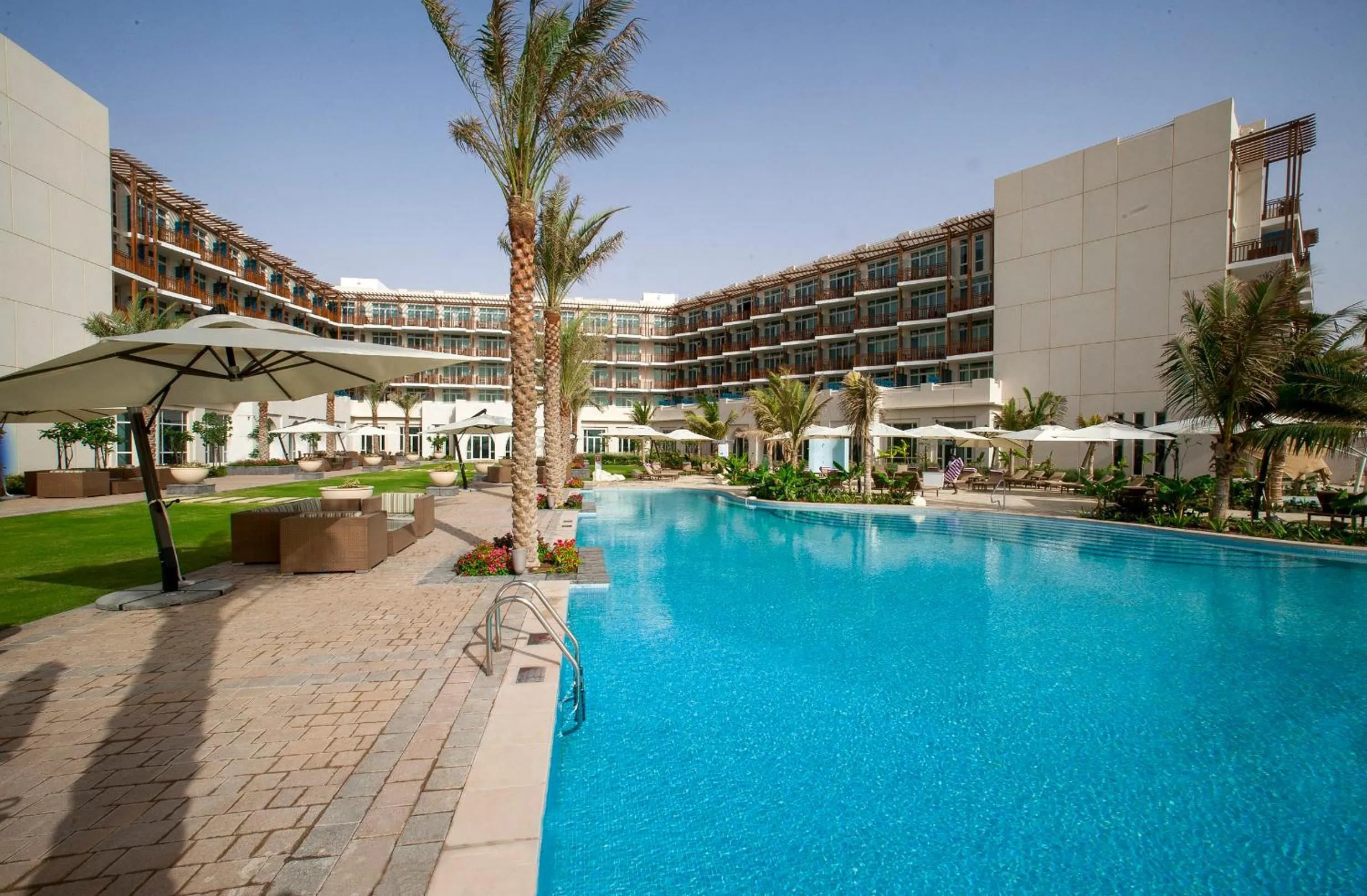 Swimming pool in Crowne Plaza Duqm by IHG