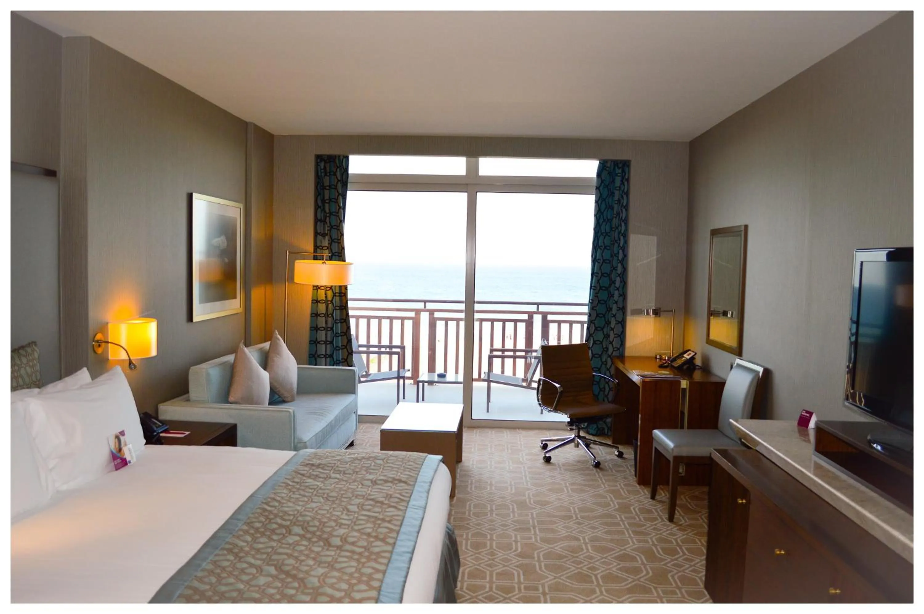 Photo of the whole room, Bed in Crowne Plaza Duqm by IHG
