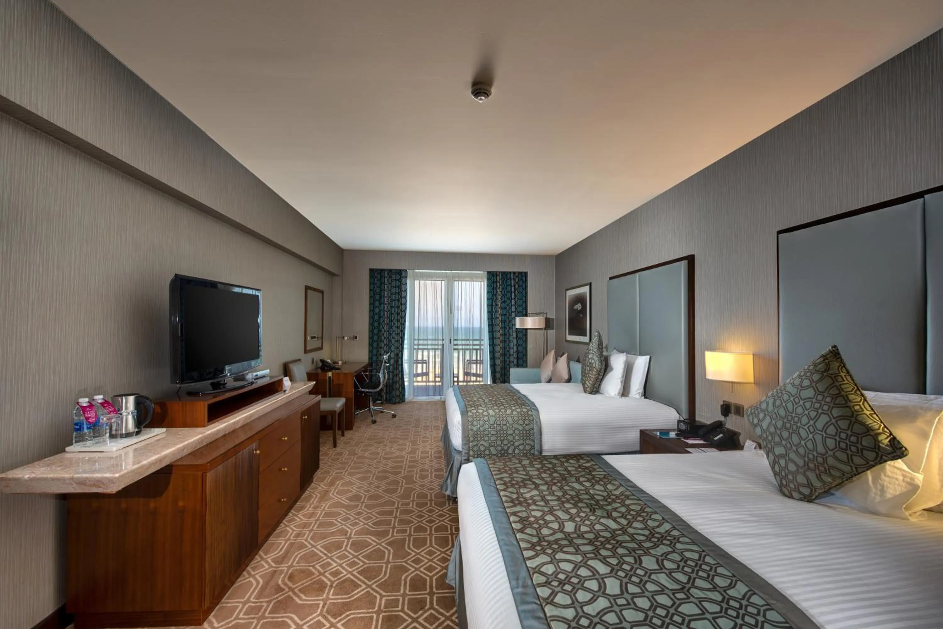 Photo of the whole room, Bed in Crowne Plaza Duqm by IHG