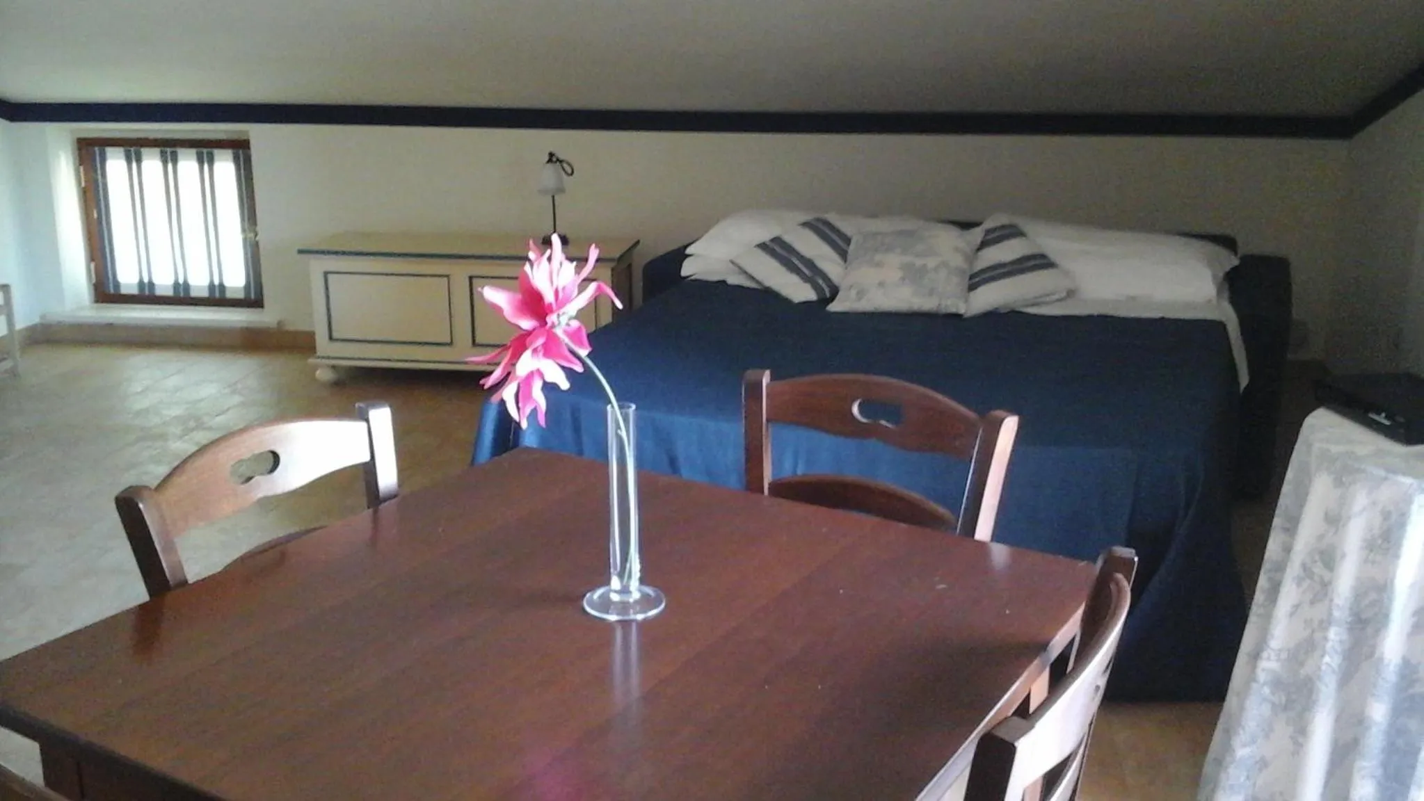 Bed in Cumana Blu Apartments