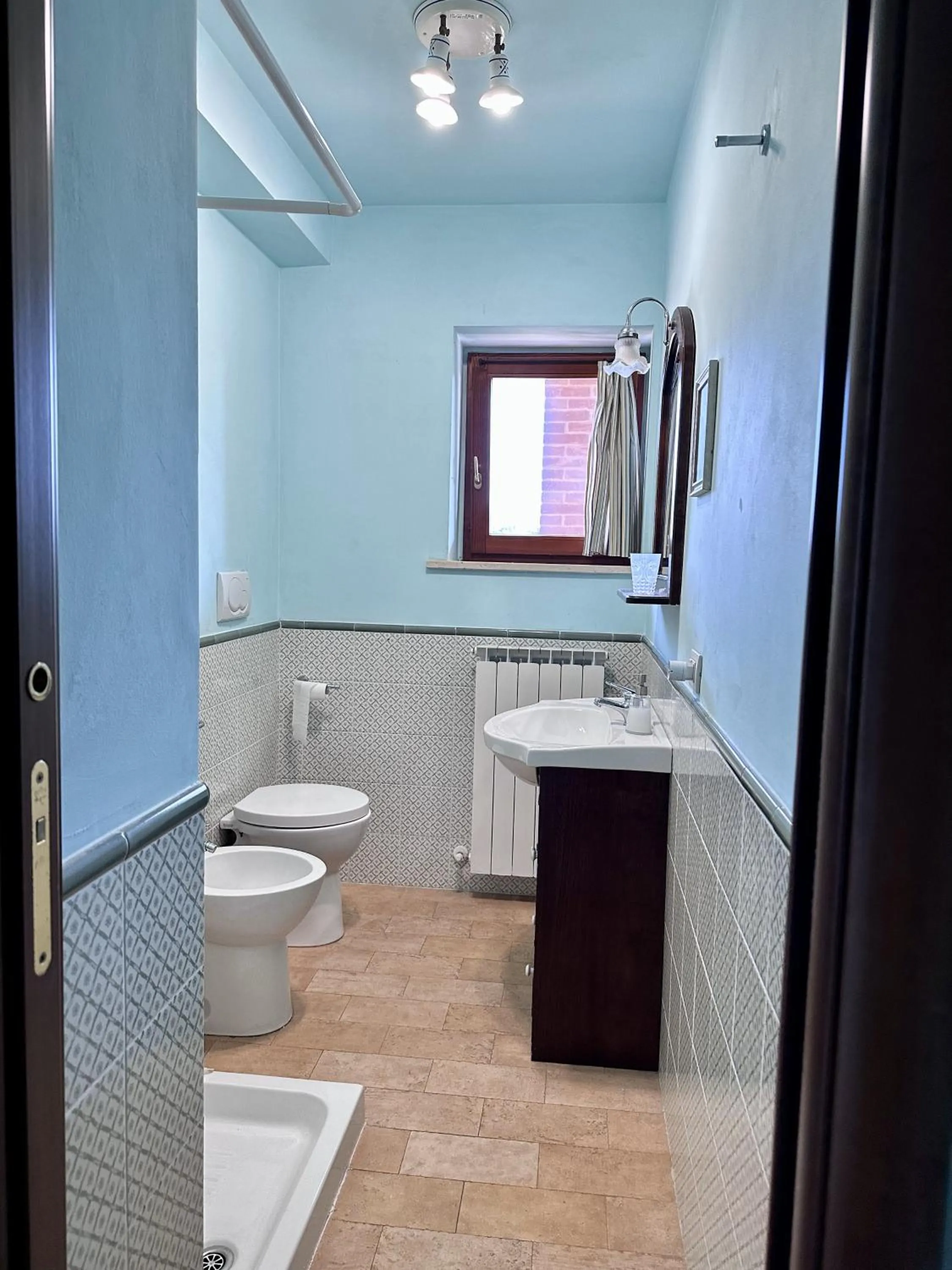 Shower in Cumana Blu Apartments