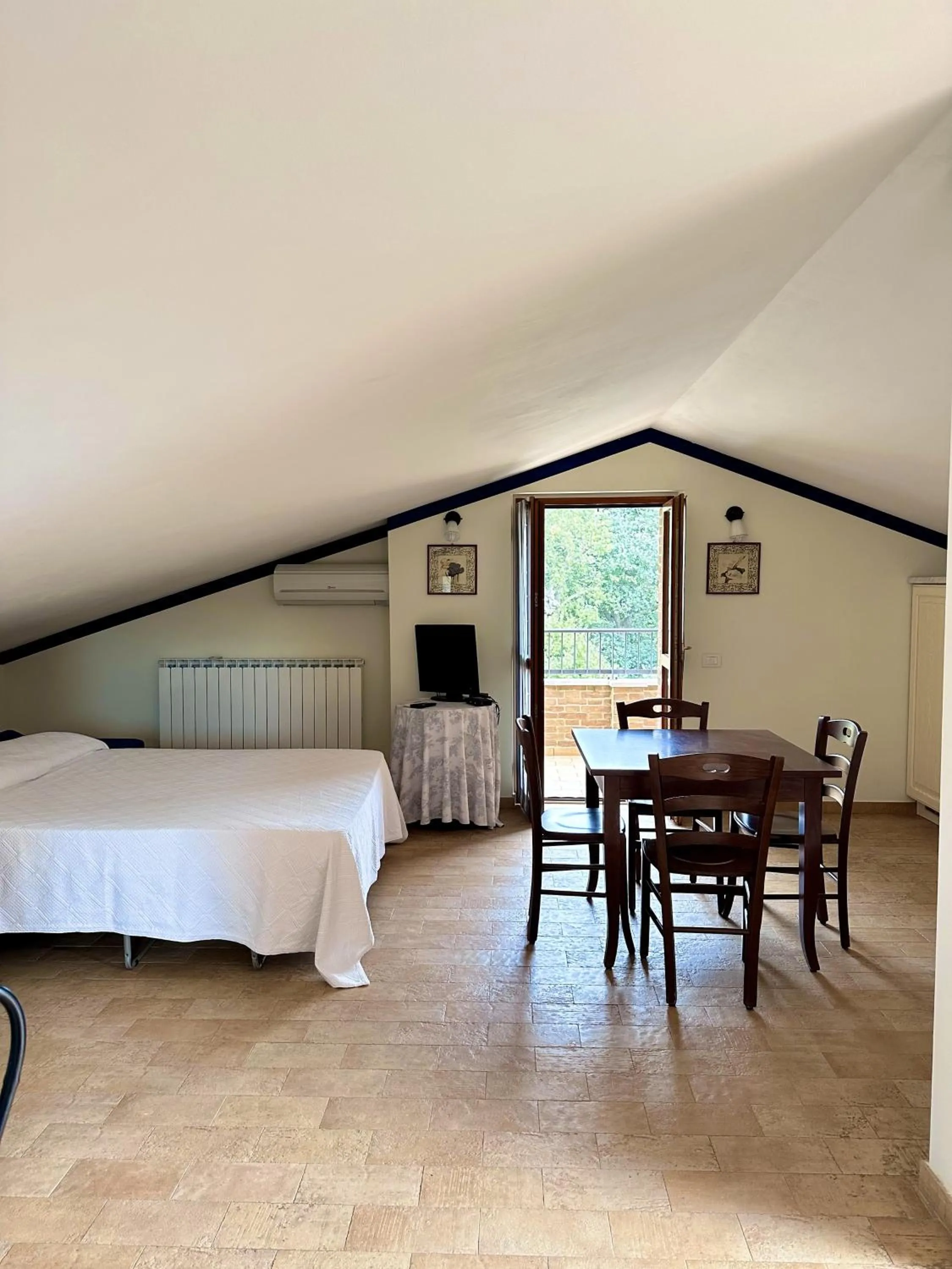 Bed in Cumana Blu Apartments