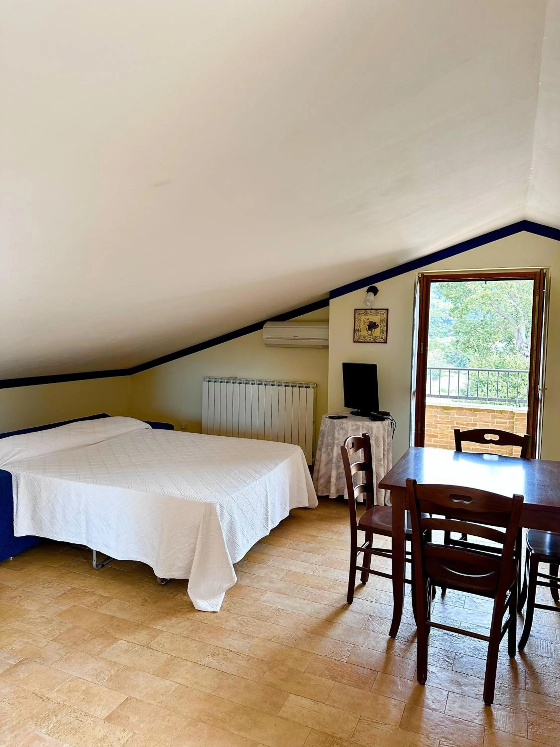 Bed in Cumana Blu Apartments