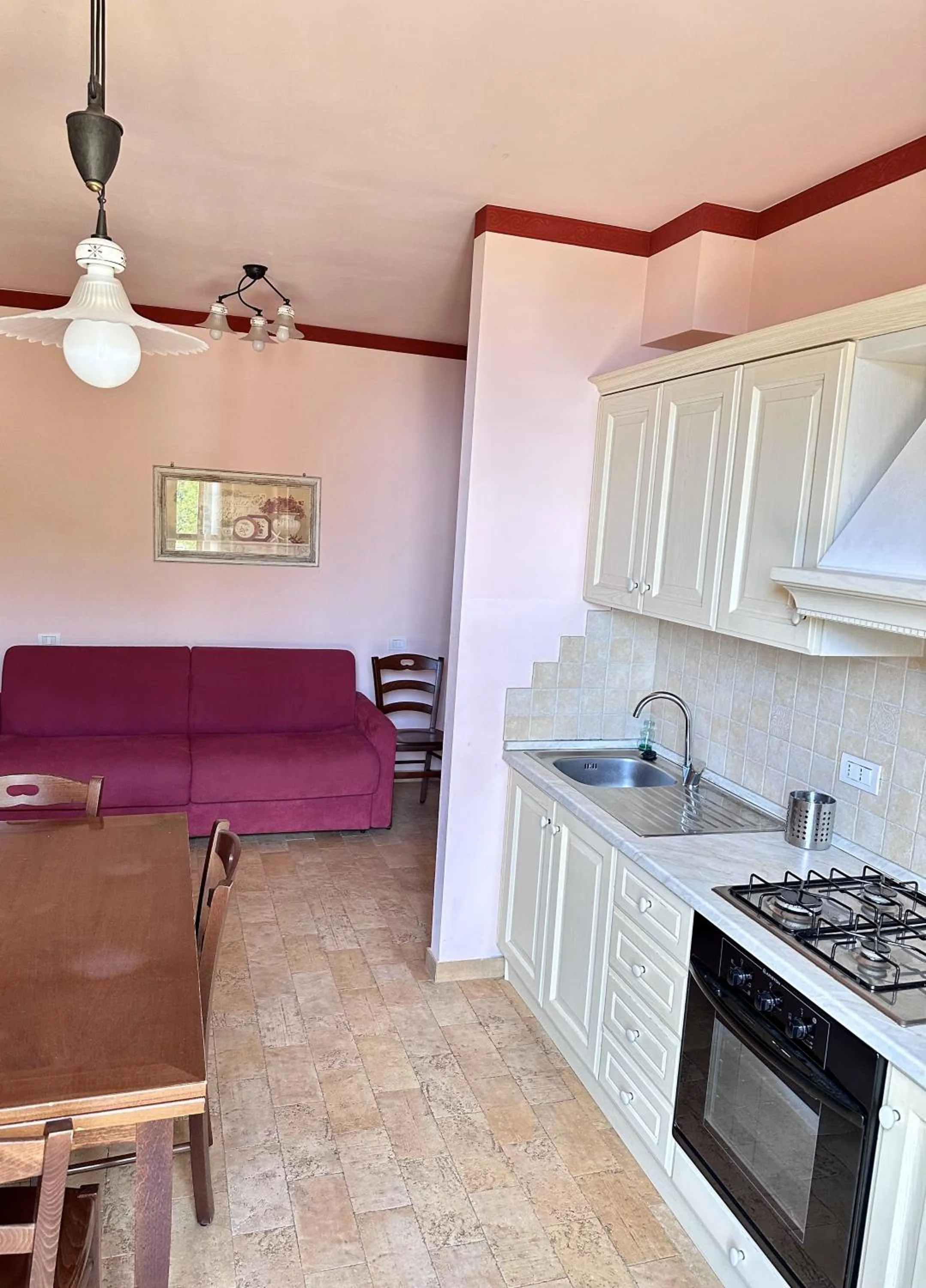 Kitchen or kitchenette in Cumana Blu Apartments
