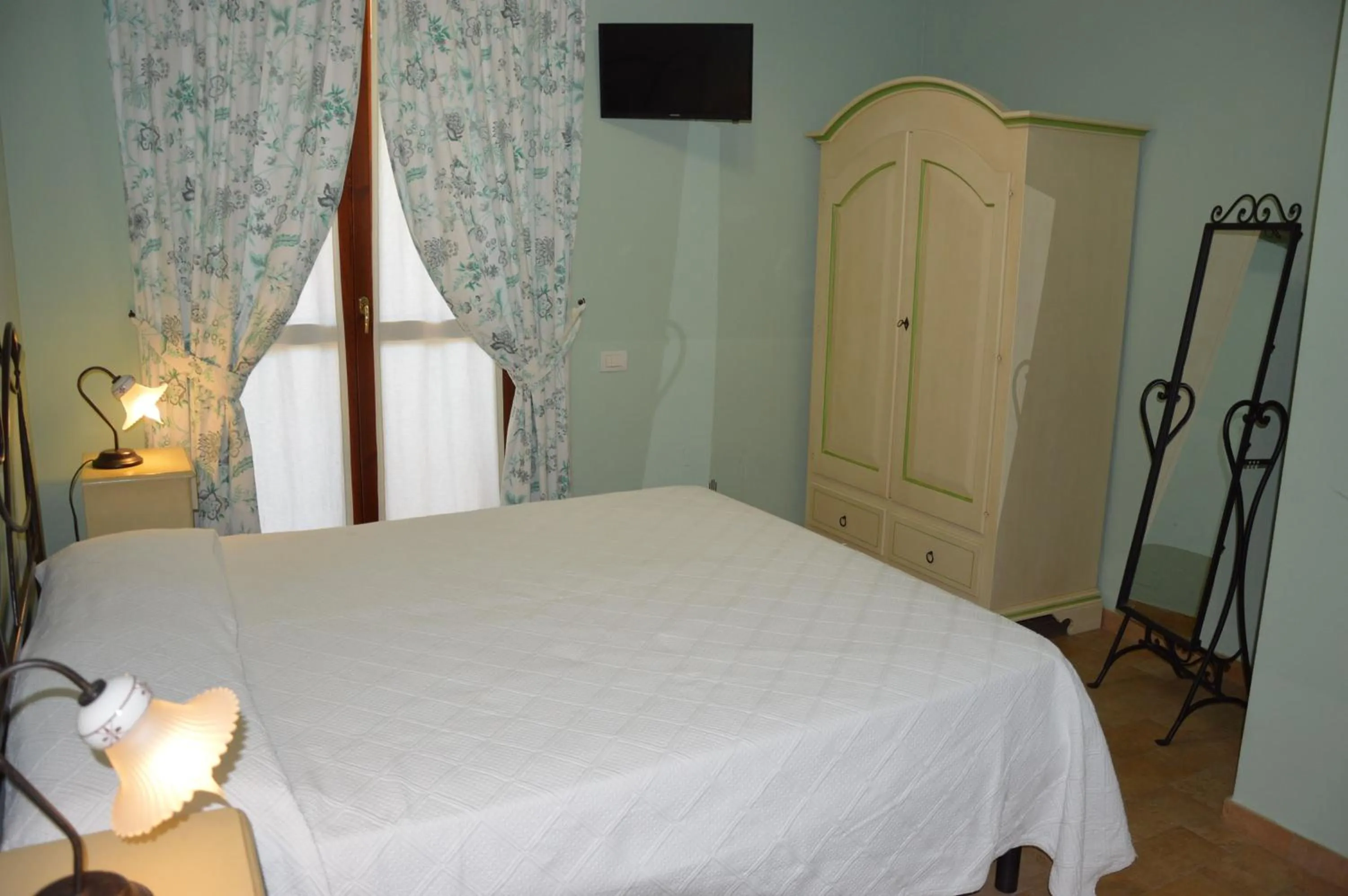 Bed in Cumana Blu Apartments