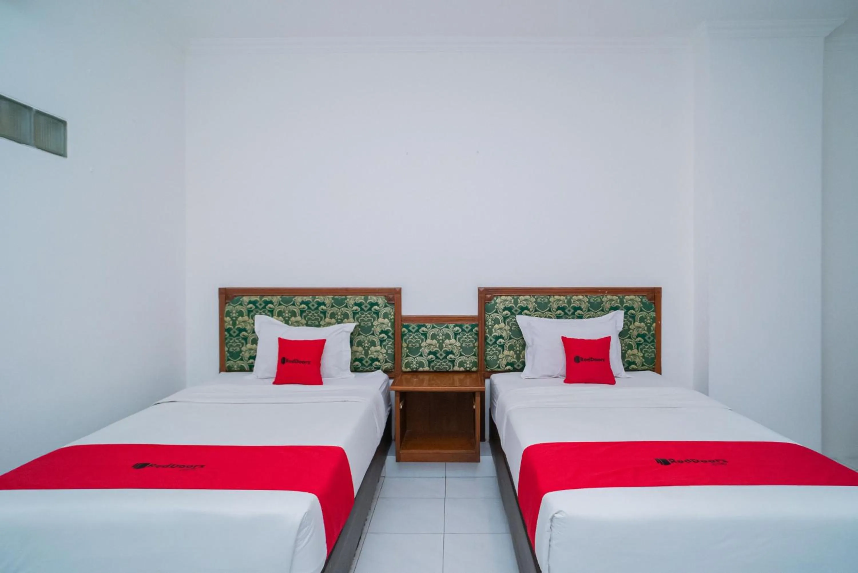 Bedroom, Bed in RedDoorz Plus at Hotel Surya Solo
