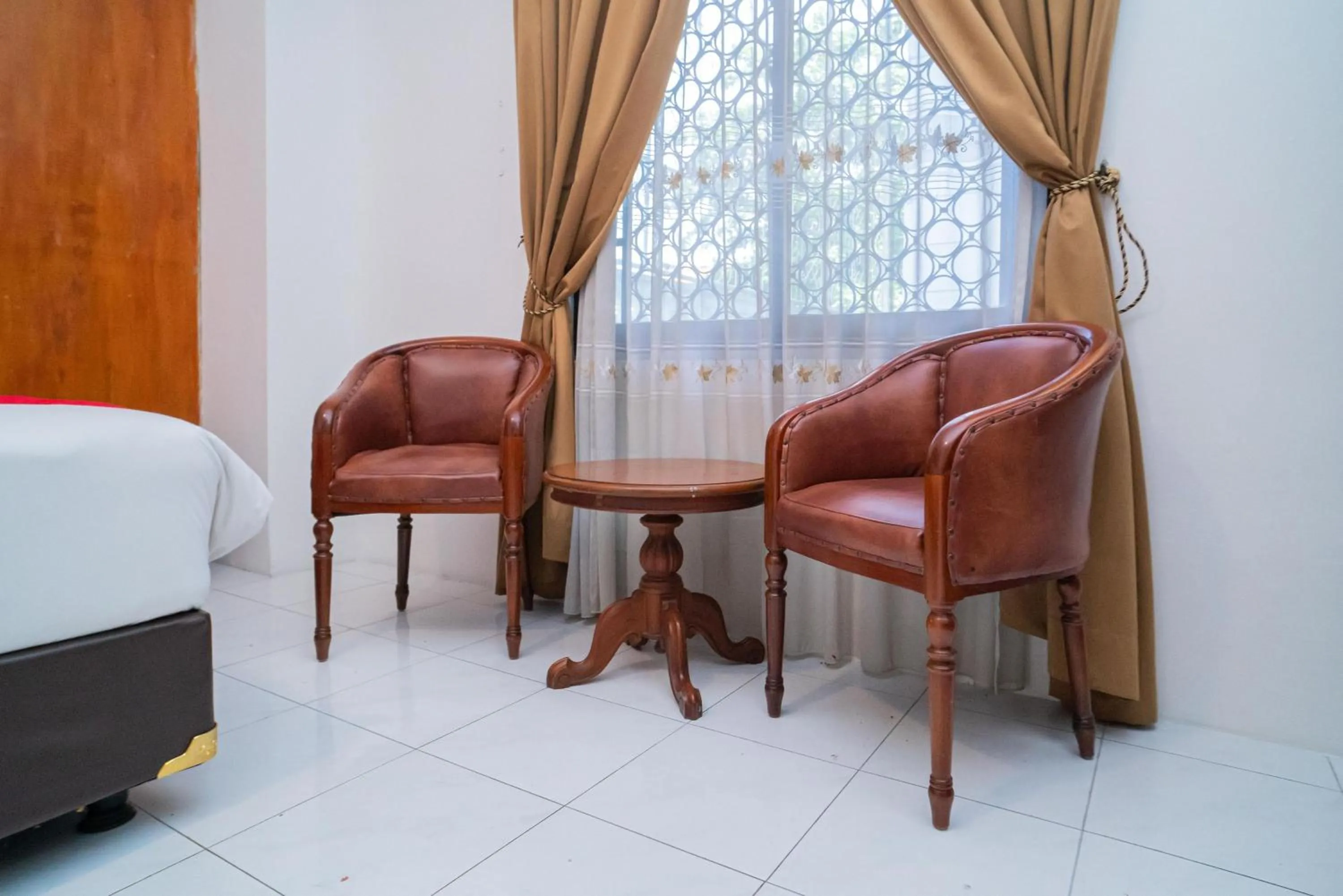 Bedroom in RedDoorz Plus at Hotel Surya Solo