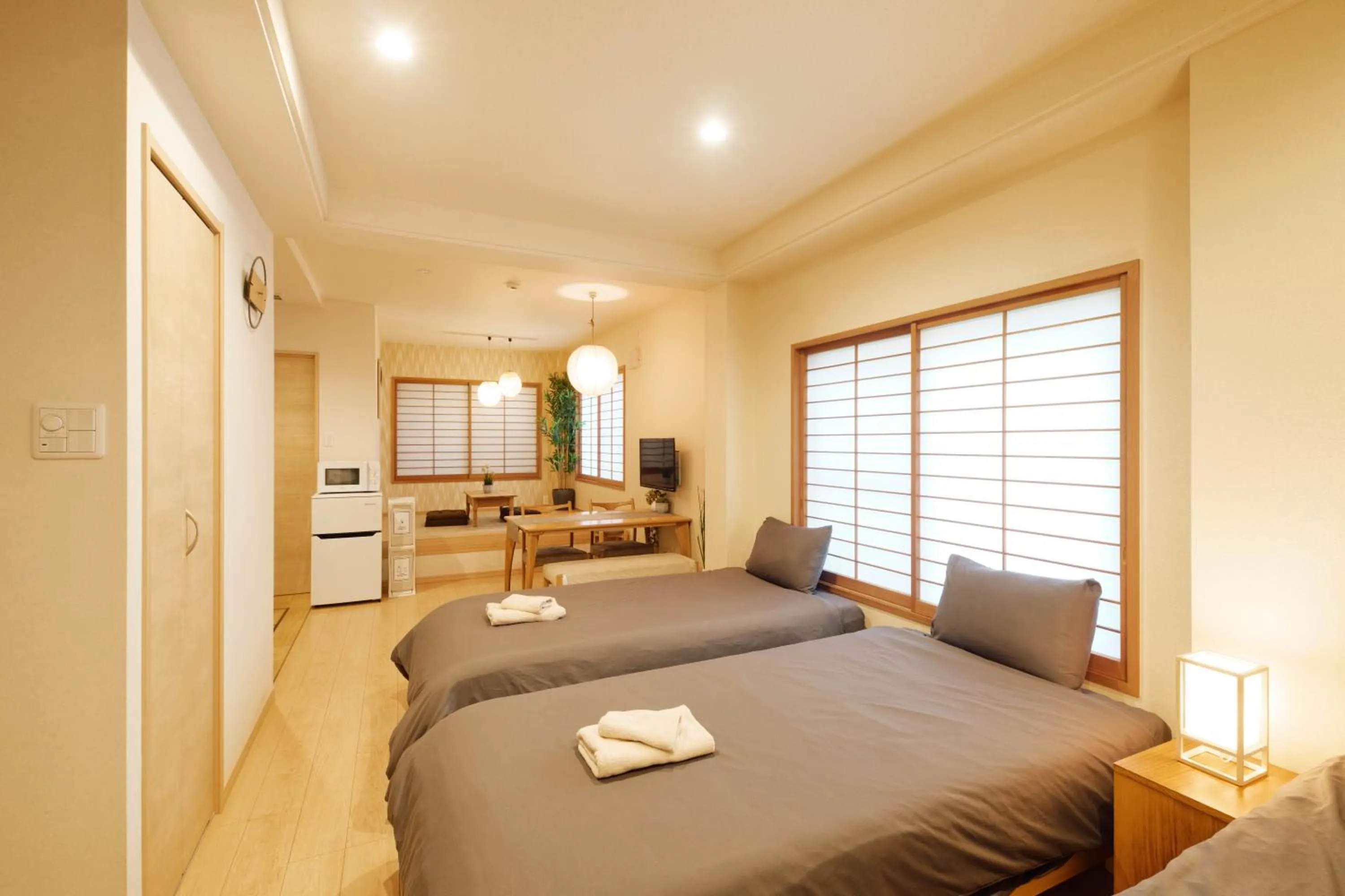 Living room, Bed in Ueno Residence Hotel Matsumoto