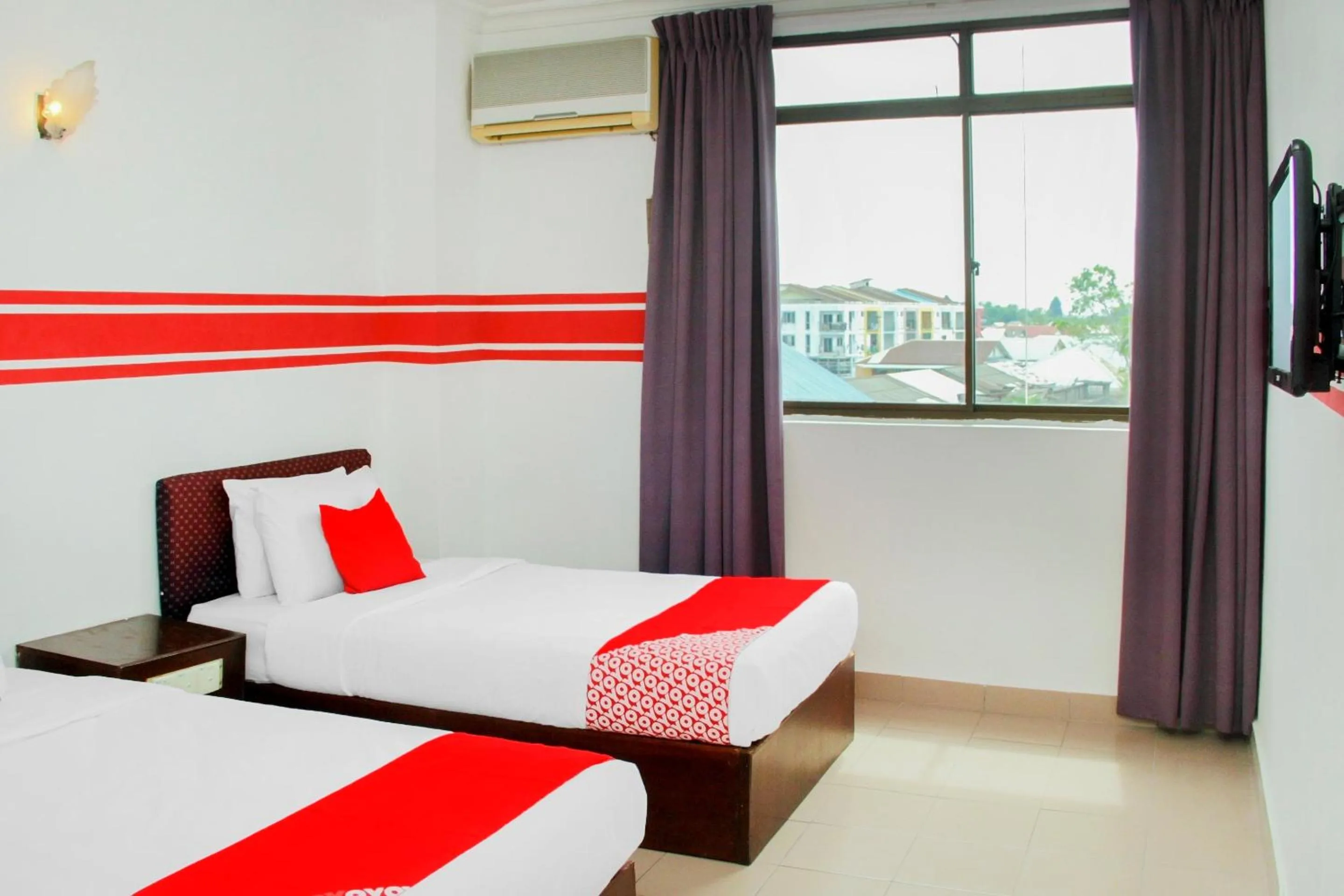 Bedroom, Bed in OYO 1173 Mandyrin Hotel