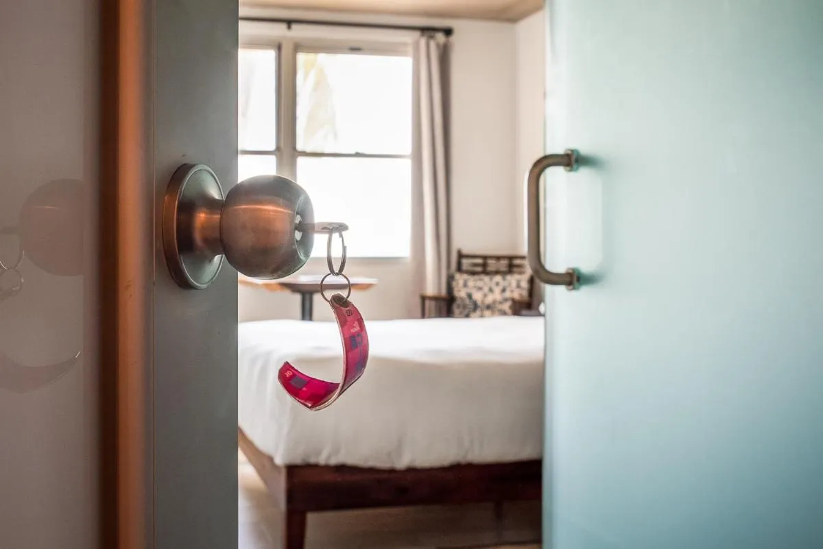 Bed in Numero Uno Beach House