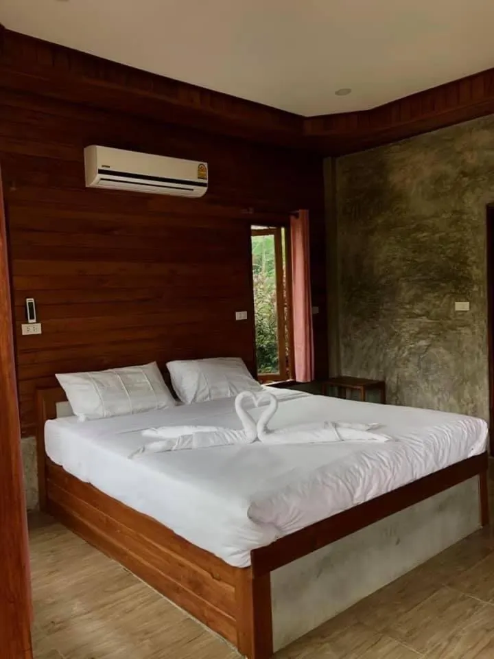 Bed in The Nanda Resort