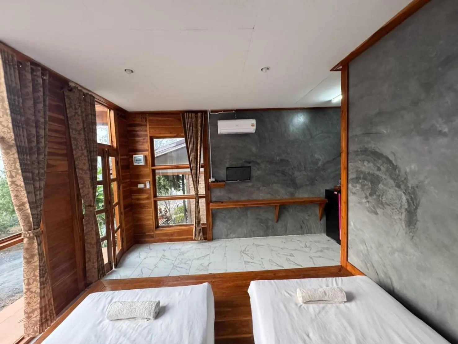 Bed in The Nanda Resort