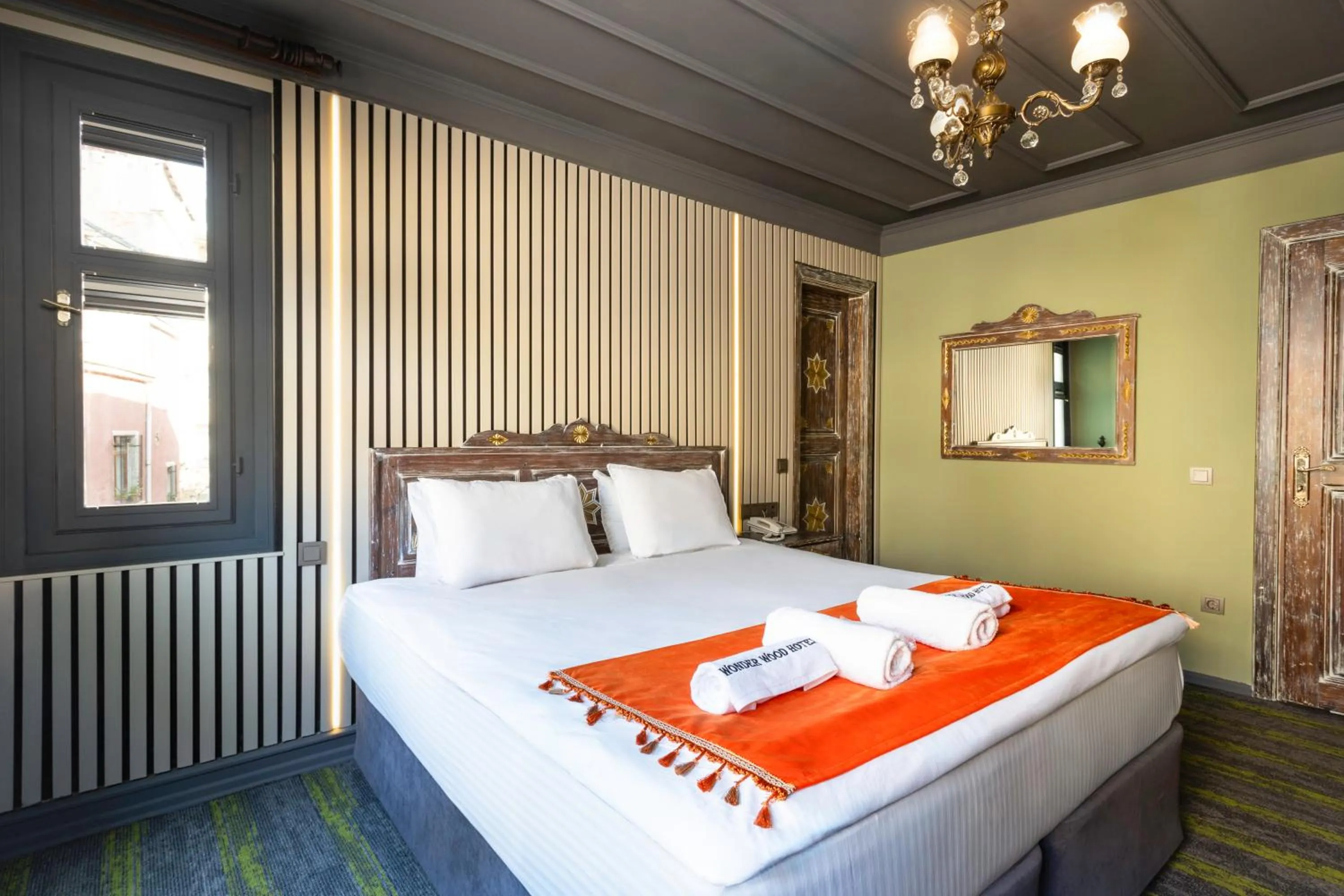 Photo of the whole room, Bed in Wonder Wood Hotel