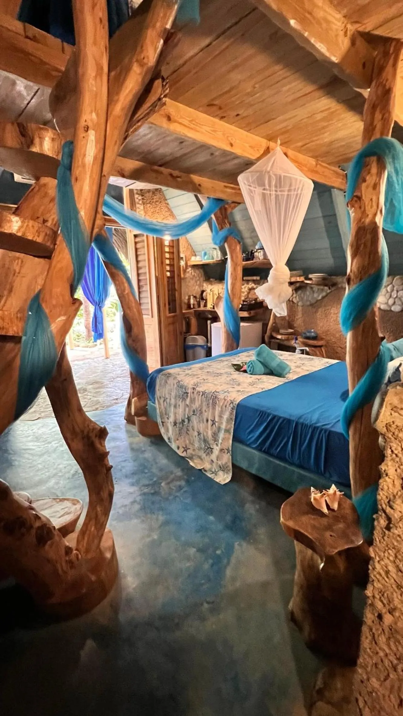 Bed in CHALET TROPICAL Hotel & Pool Bar Restaurant