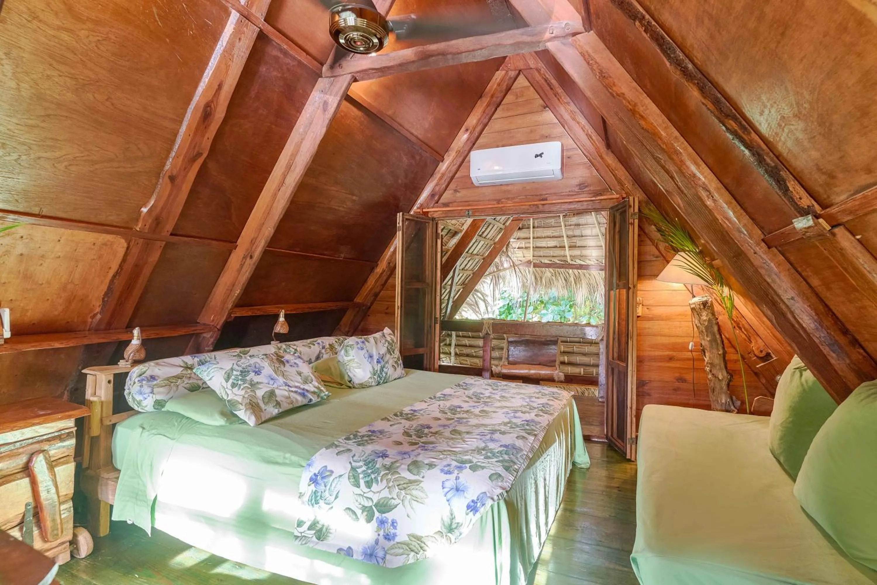 Bedroom, Bed in CHALET TROPICAL Hotel & Pool Bar Restaurant