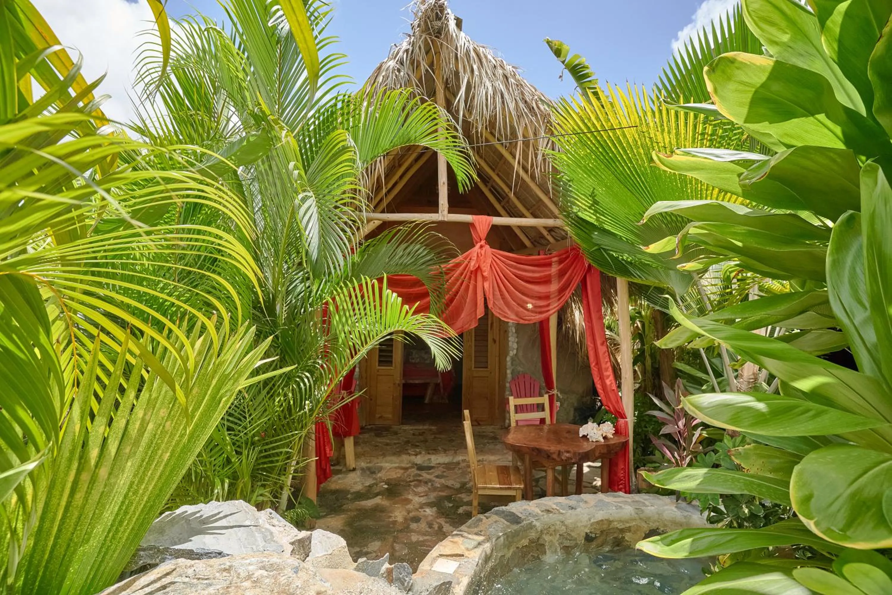 Patio in CHALET TROPICAL Hotel & Pool Bar Restaurant