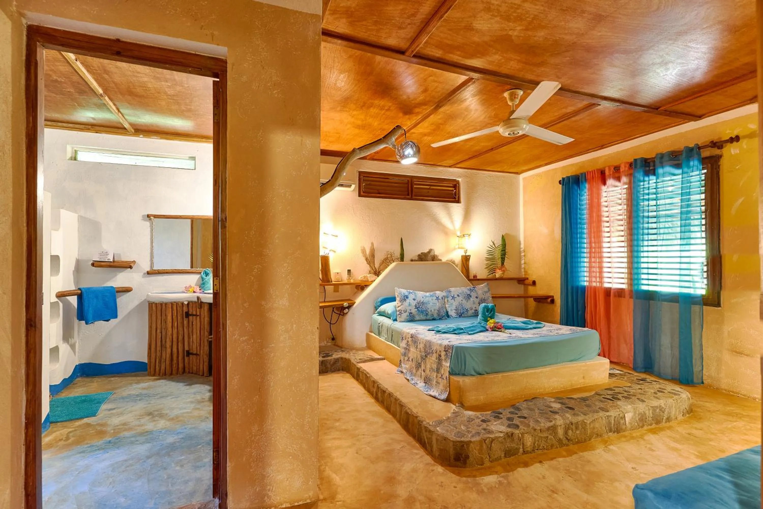 Bathroom, Bed in CHALET TROPICAL Hotel & Pool Bar Restaurant