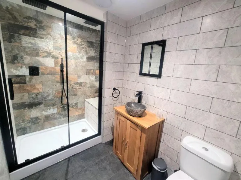 Bathroom in Nelson By The Docks Serviced Apartments by Roomsbooked
