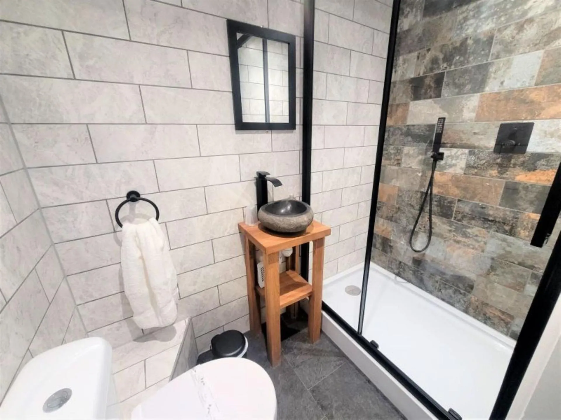 Bathroom in Nelson By The Docks Serviced Apartments by Roomsbooked