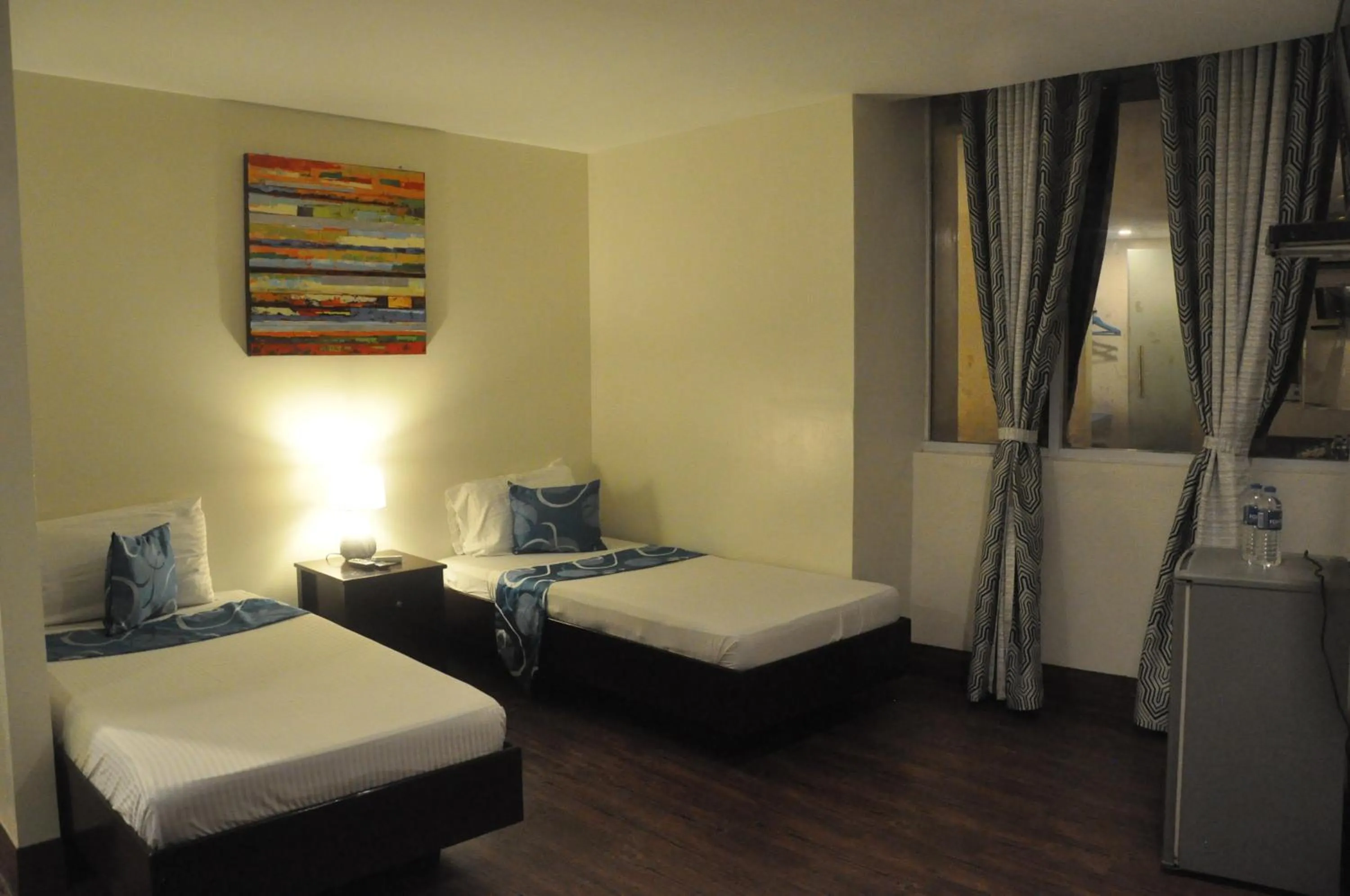 Bed in Skyblue Hotel