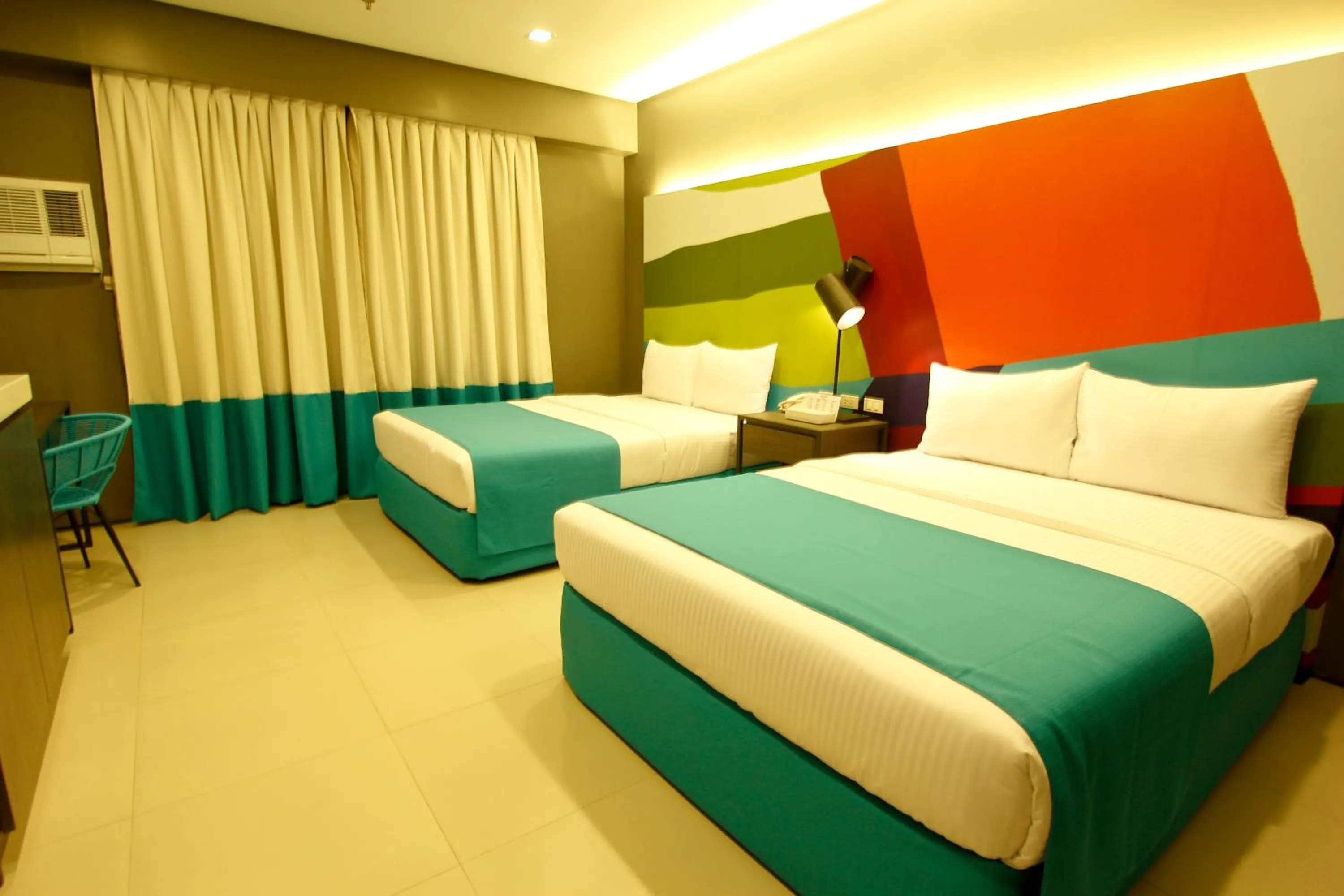 Photo of the whole room, Bed in Boracay Uptown