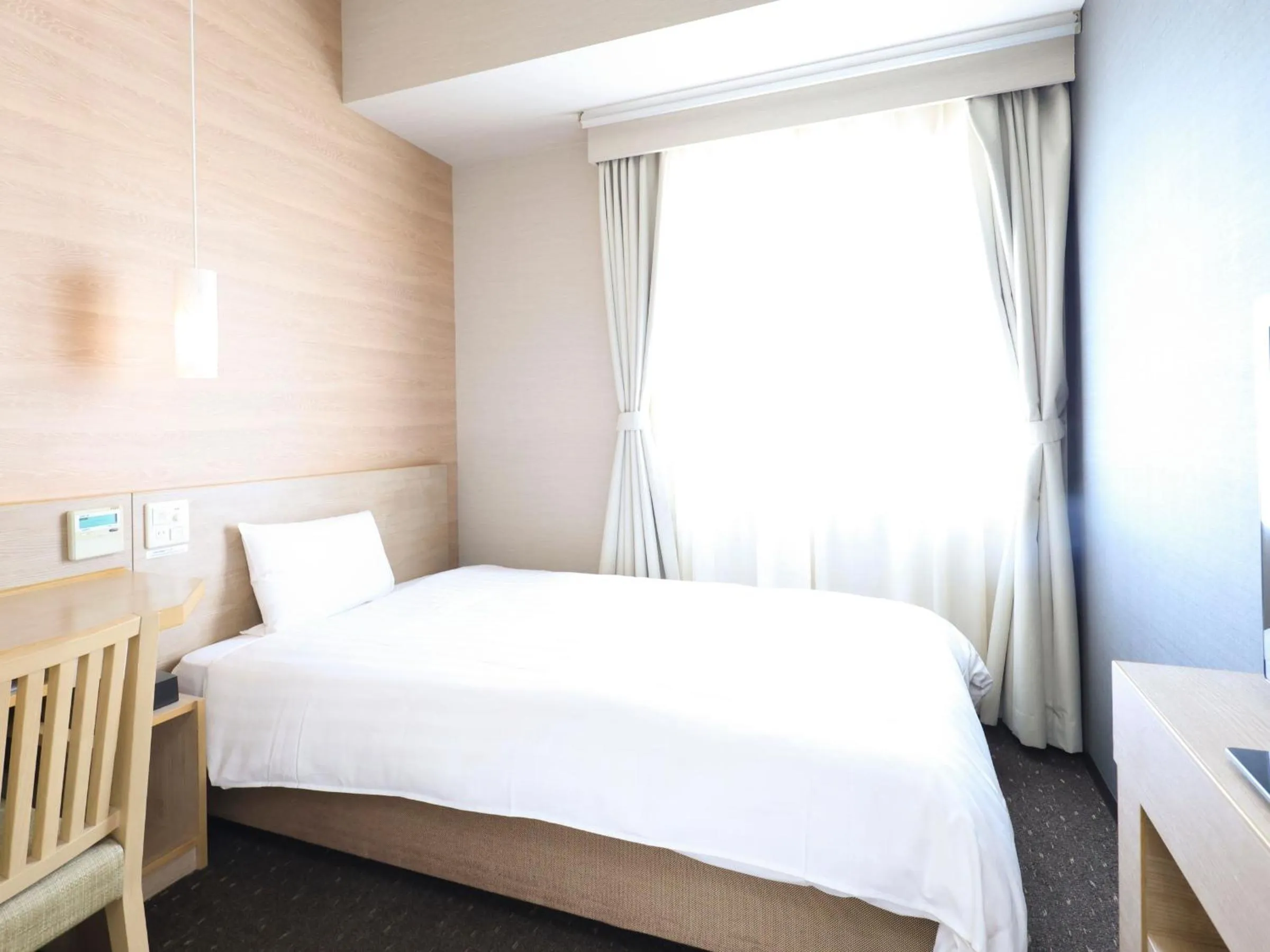 Bed in Dormy Inn Gifu Ekimae