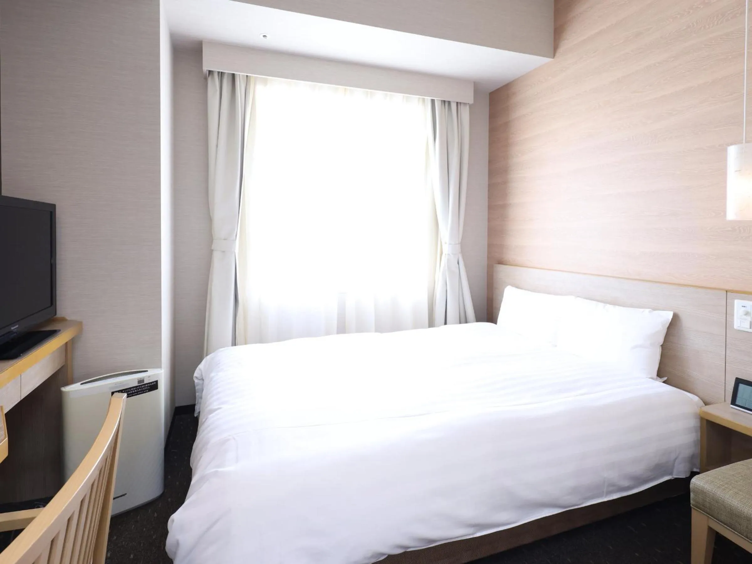 Bed in Dormy Inn Gifu Ekimae