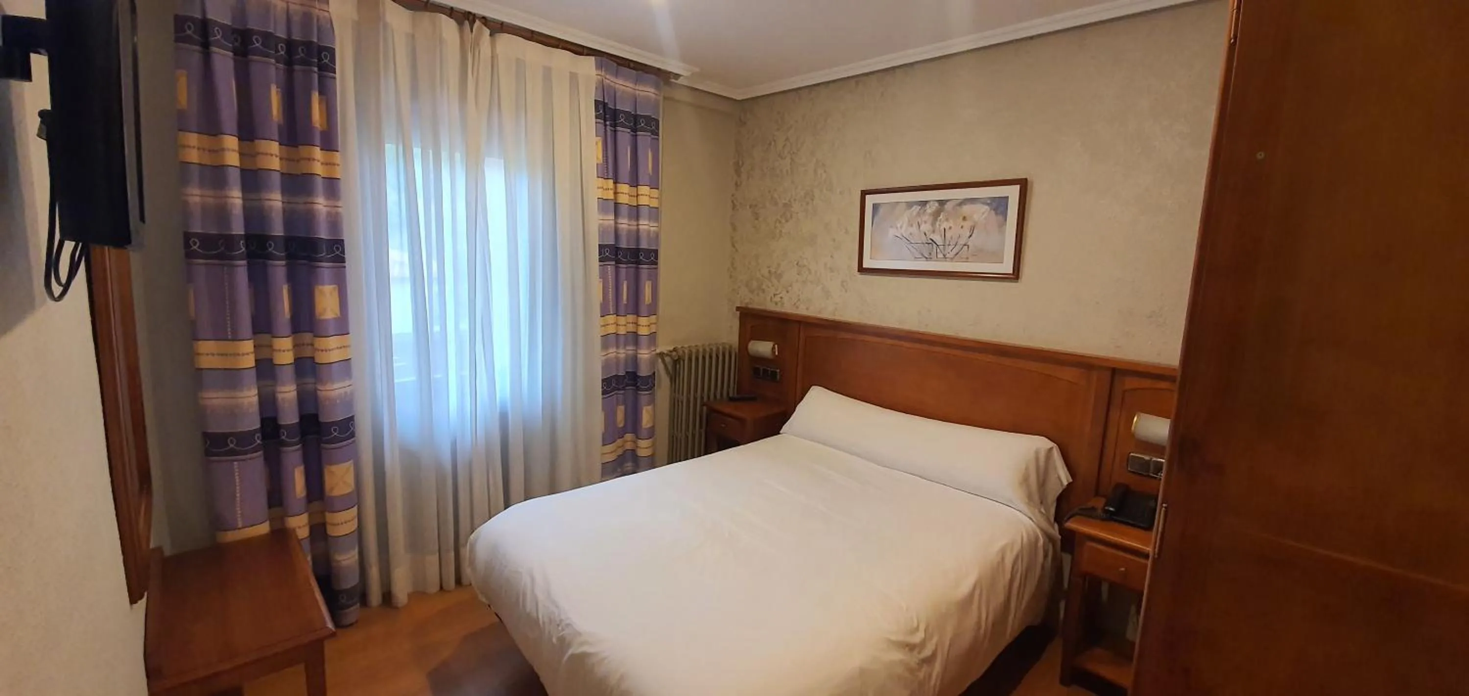 Bed in Hotel Gomar