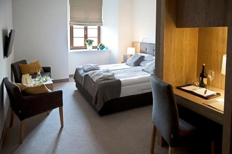 Bed in Uroczysko Siedmiu Stawów & Spa by L'Occitane