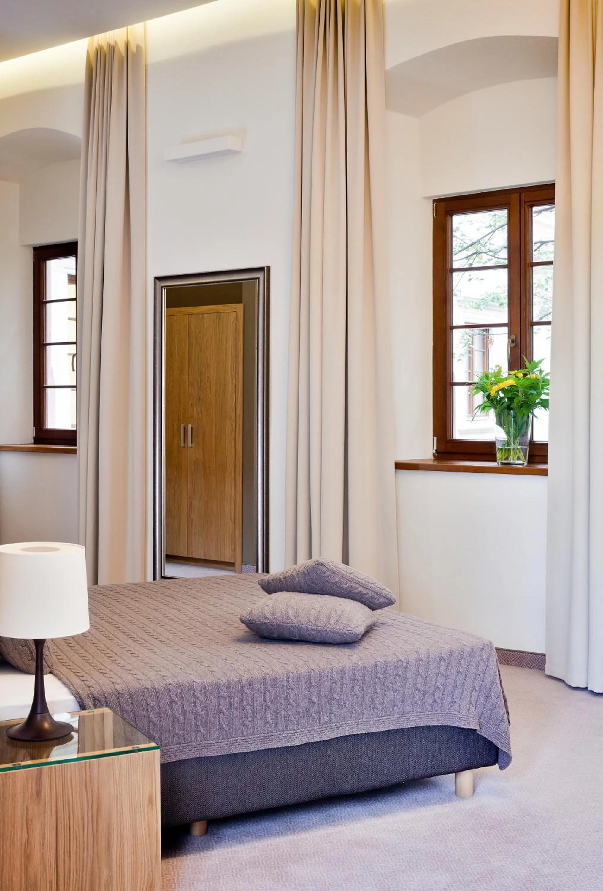 Bed in Uroczysko Siedmiu Stawów & Spa by L'Occitane