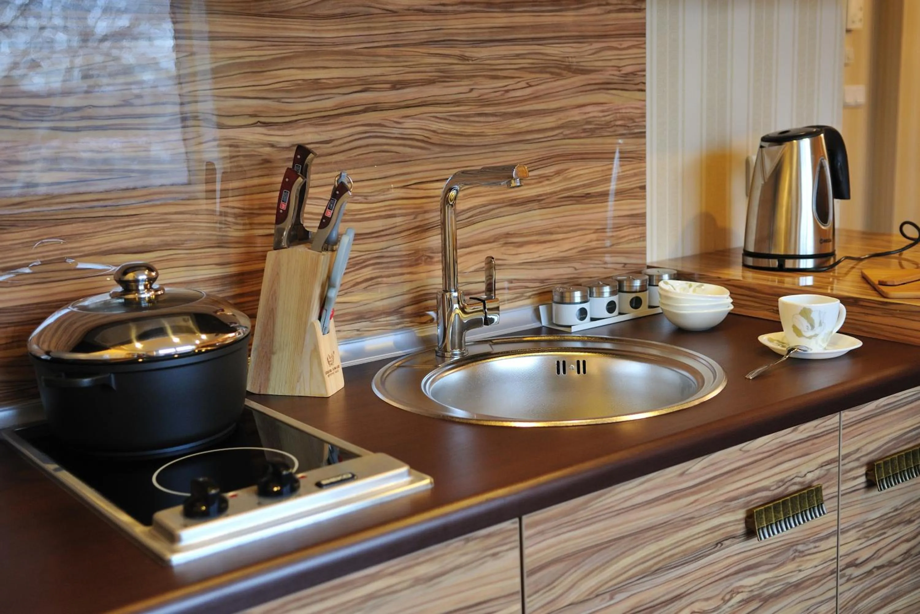 Kitchen or kitchenette in Darhan Boutique Hotel