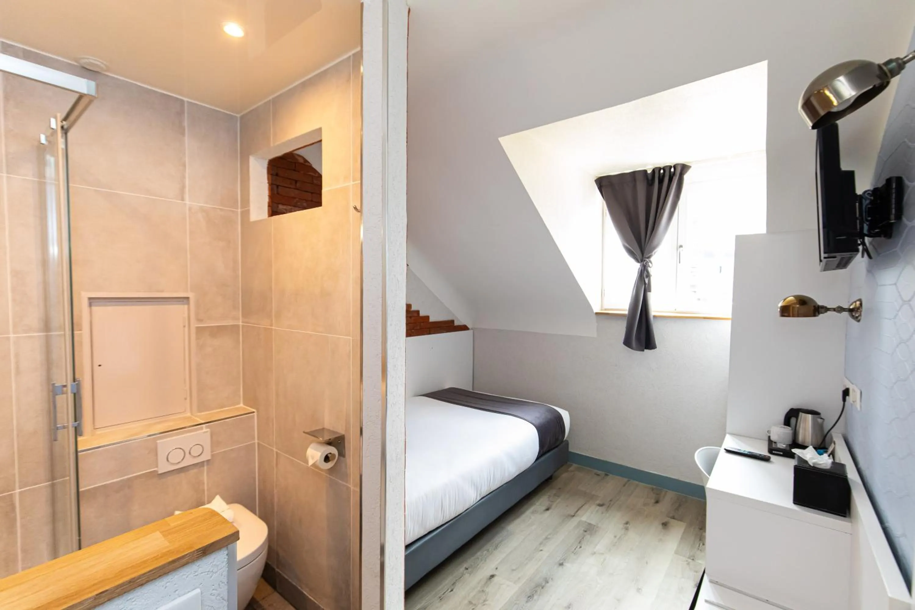 Photo of the whole room, Bed in HOTEL DE PARIS MONTPARNASSE