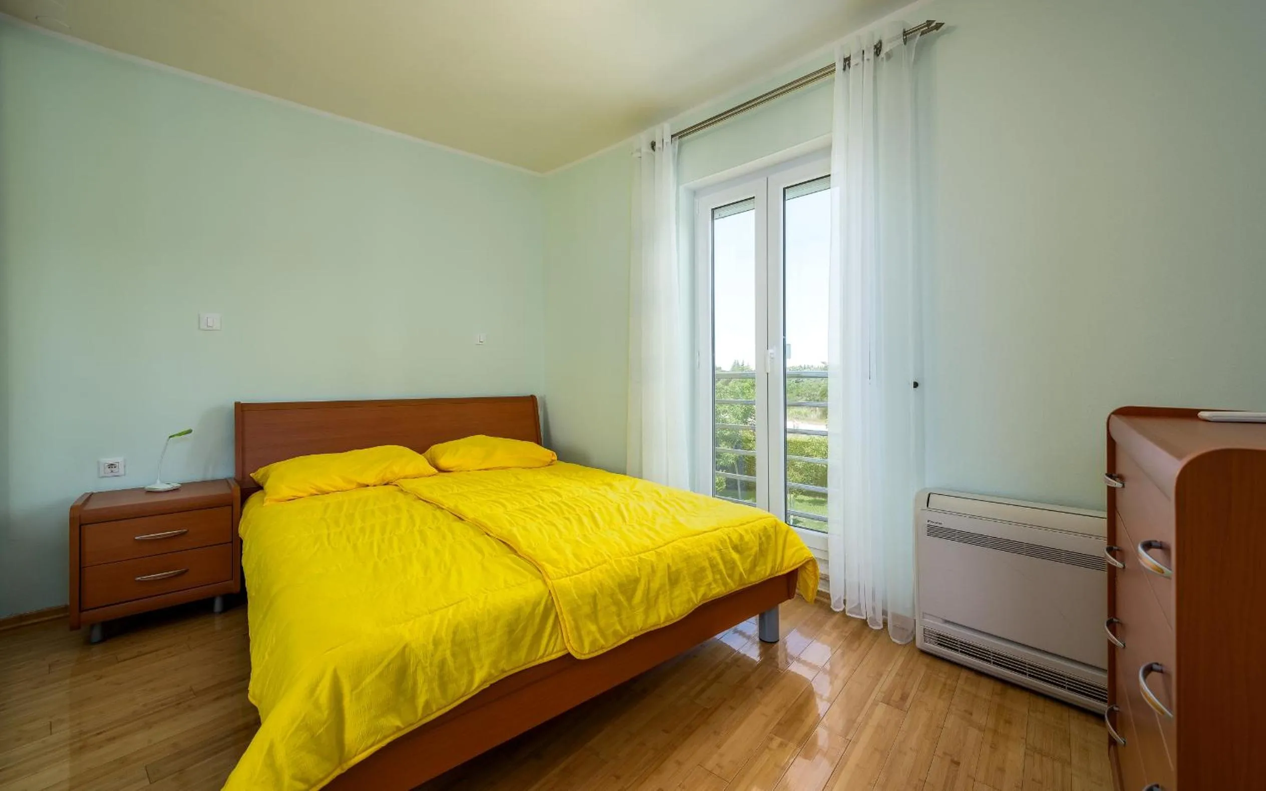 Bed in Adria Apartments