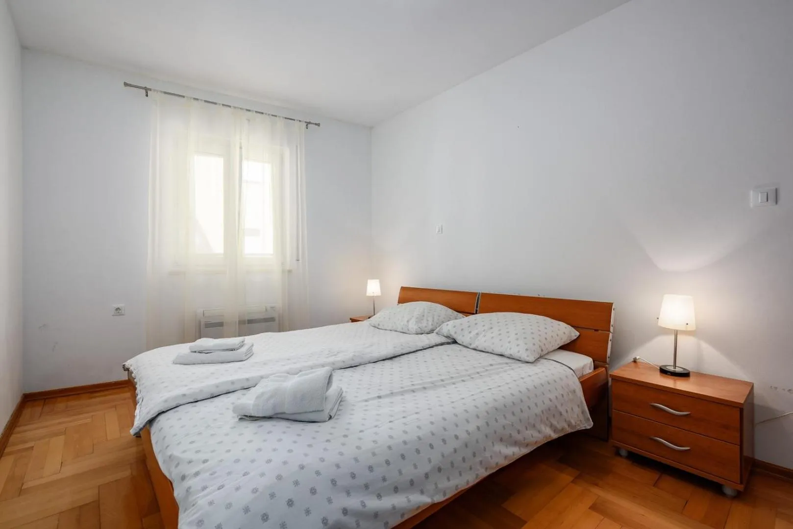 Bed in Adria Apartments
