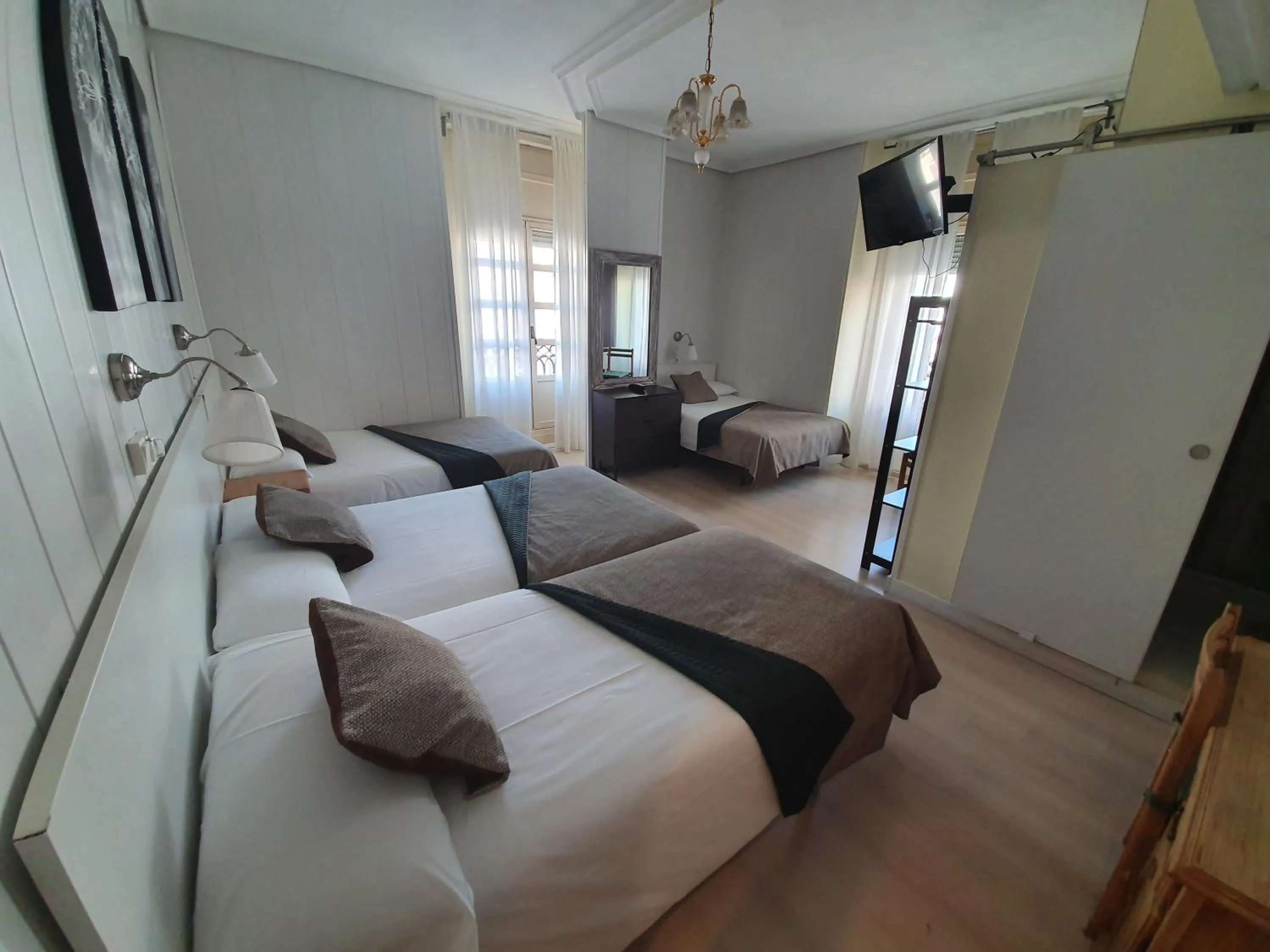 Photo of the whole room, Bed in Hostal Riesco