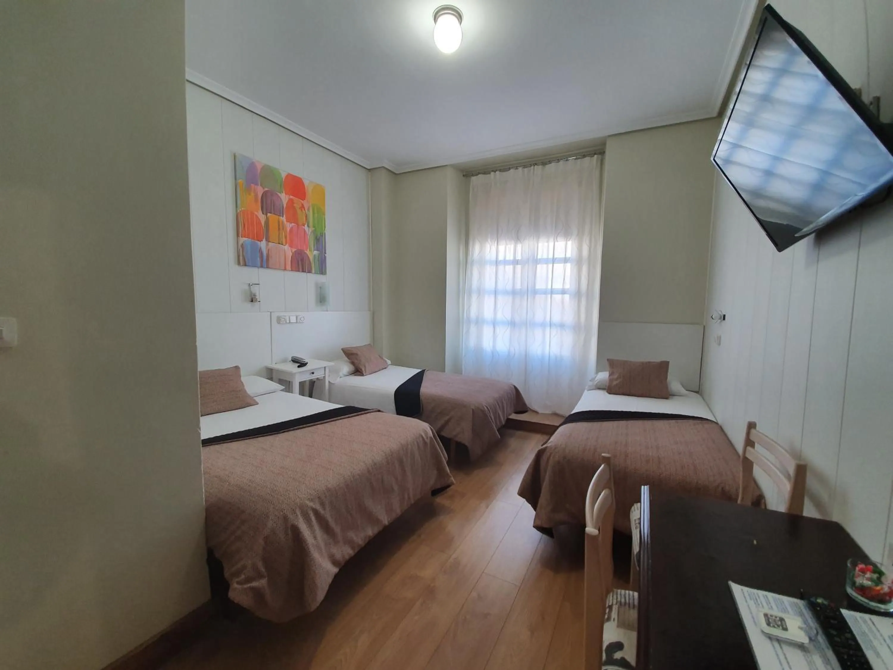 Photo of the whole room, Bed in Hostal Riesco