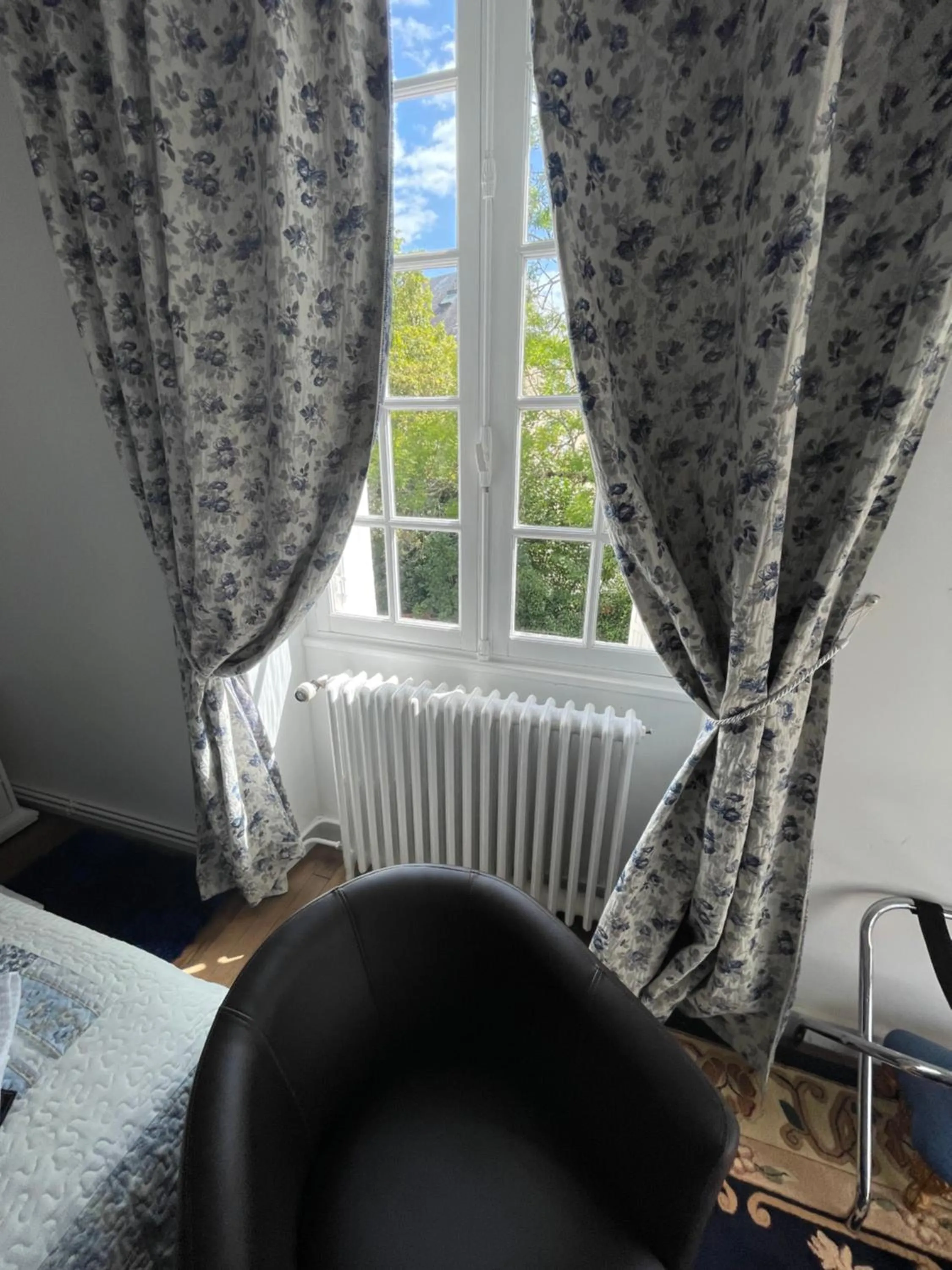 Bed in Vue du Château d'Excideuil en chambres