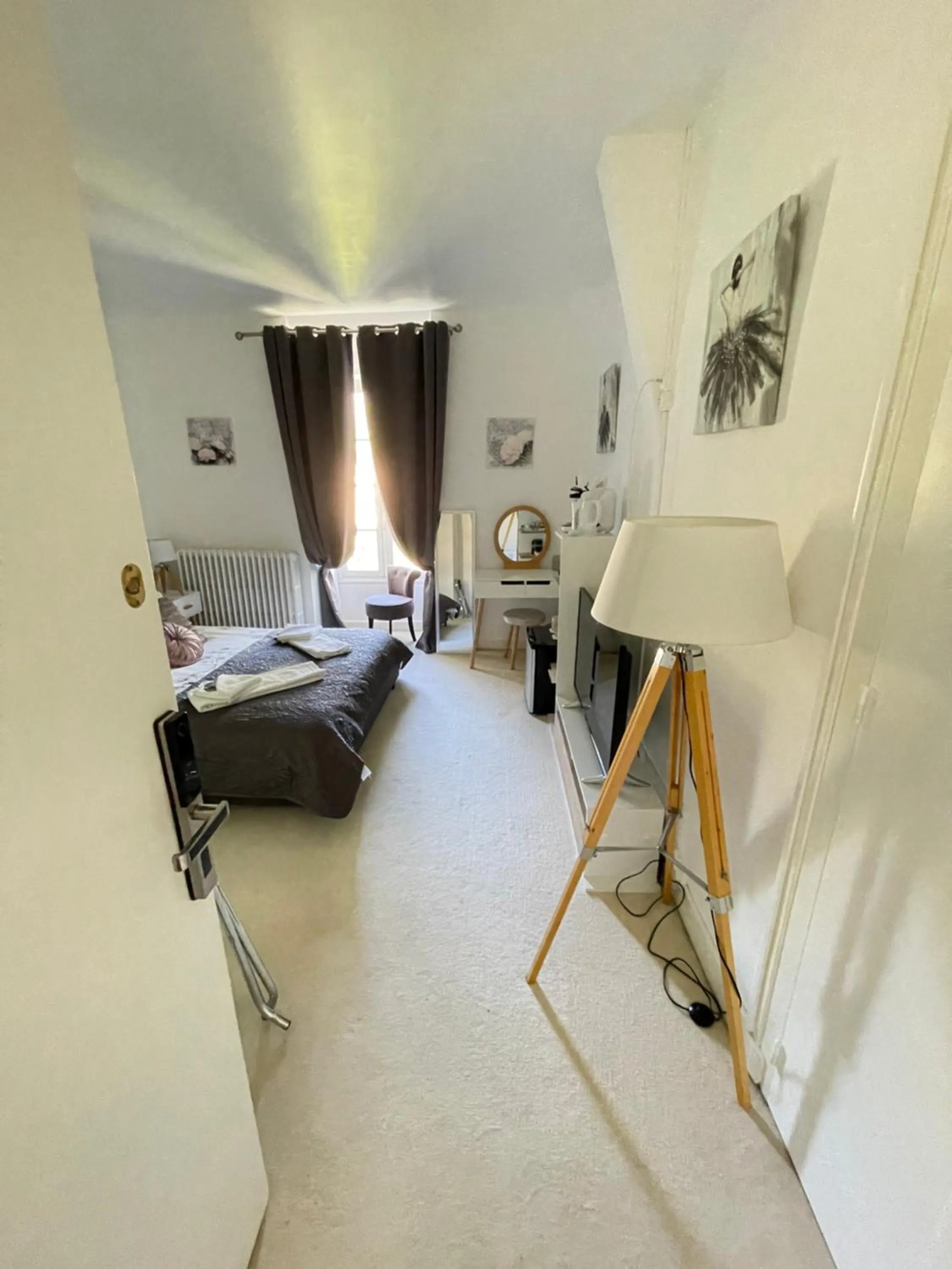 Bed in Vue du Château d'Excideuil en chambres