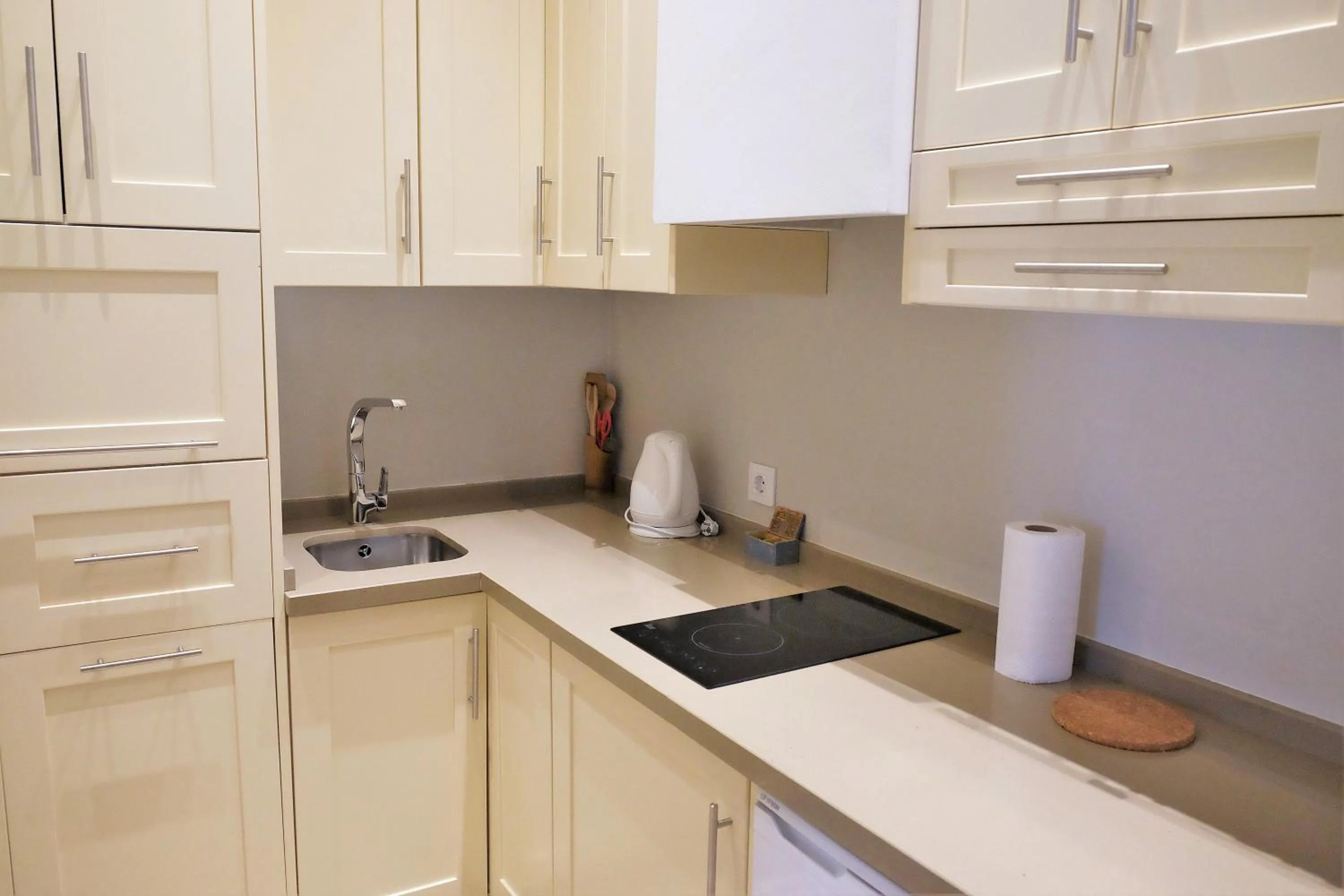 Kitchen or kitchenette in ApartaSuites Alberca Deluxe