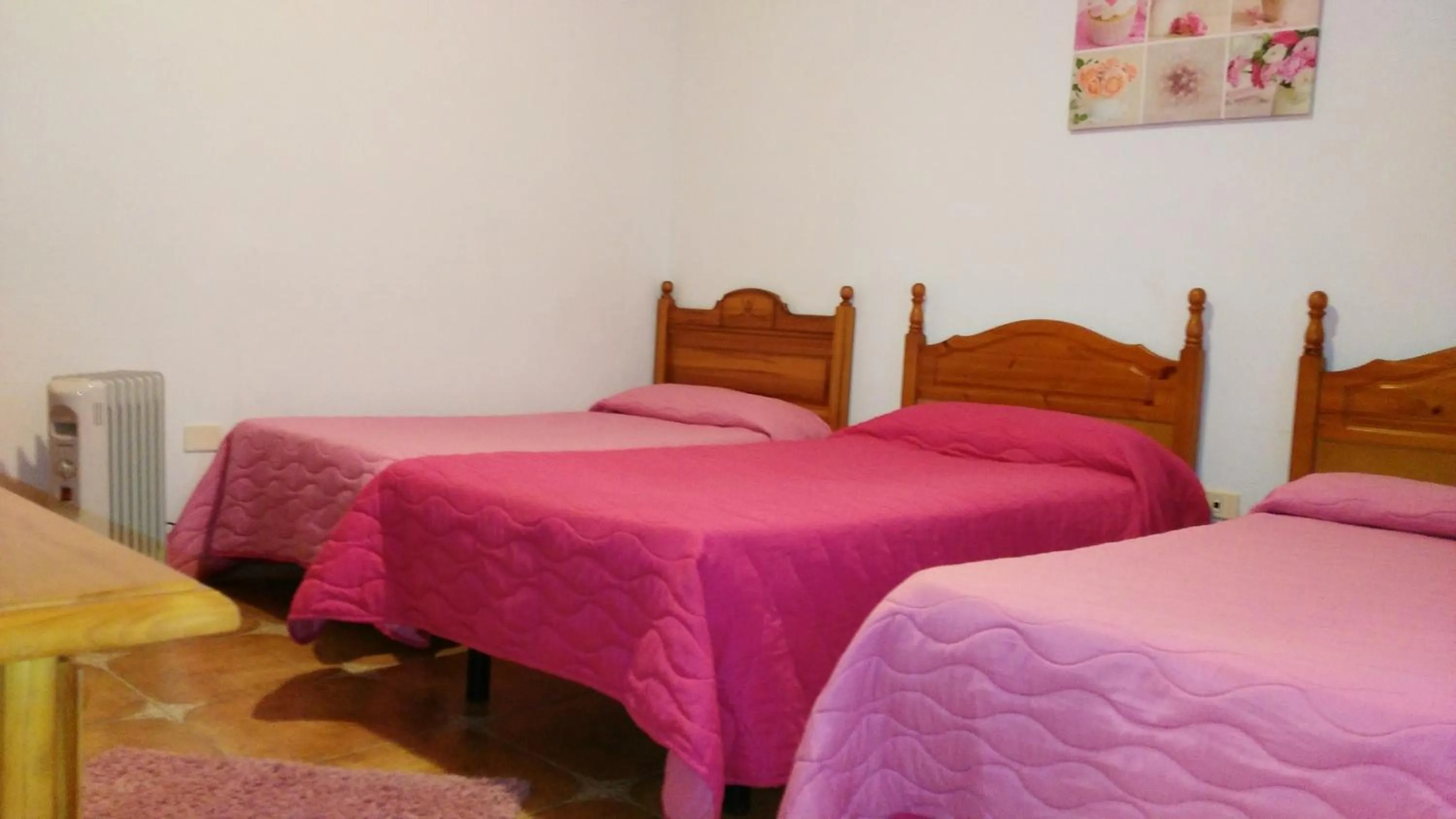 Bed in Pensión Amparo Las Hayas