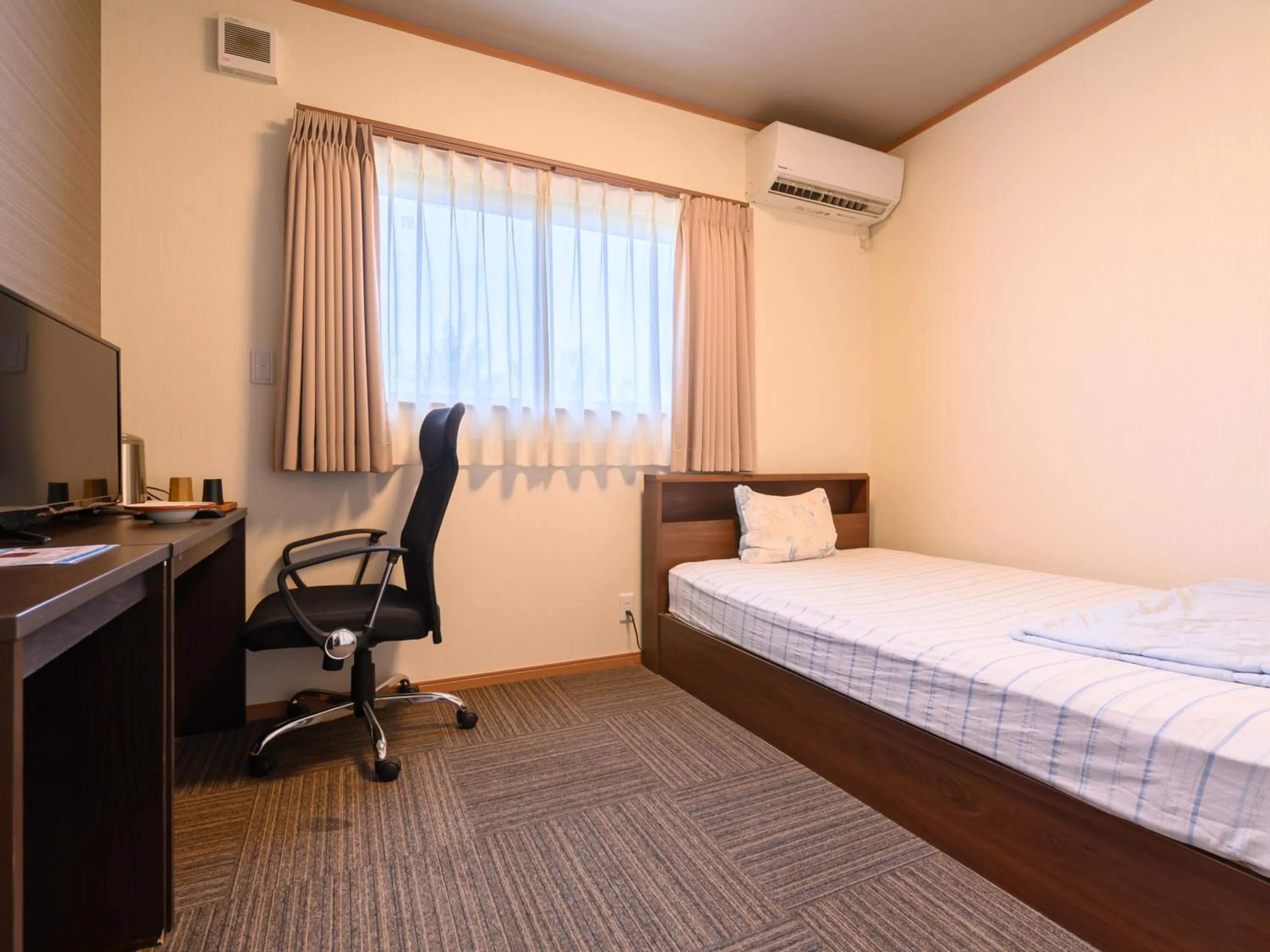 Photo of the whole room, Bed in Tabist Miya Yokkaichi Suizawa